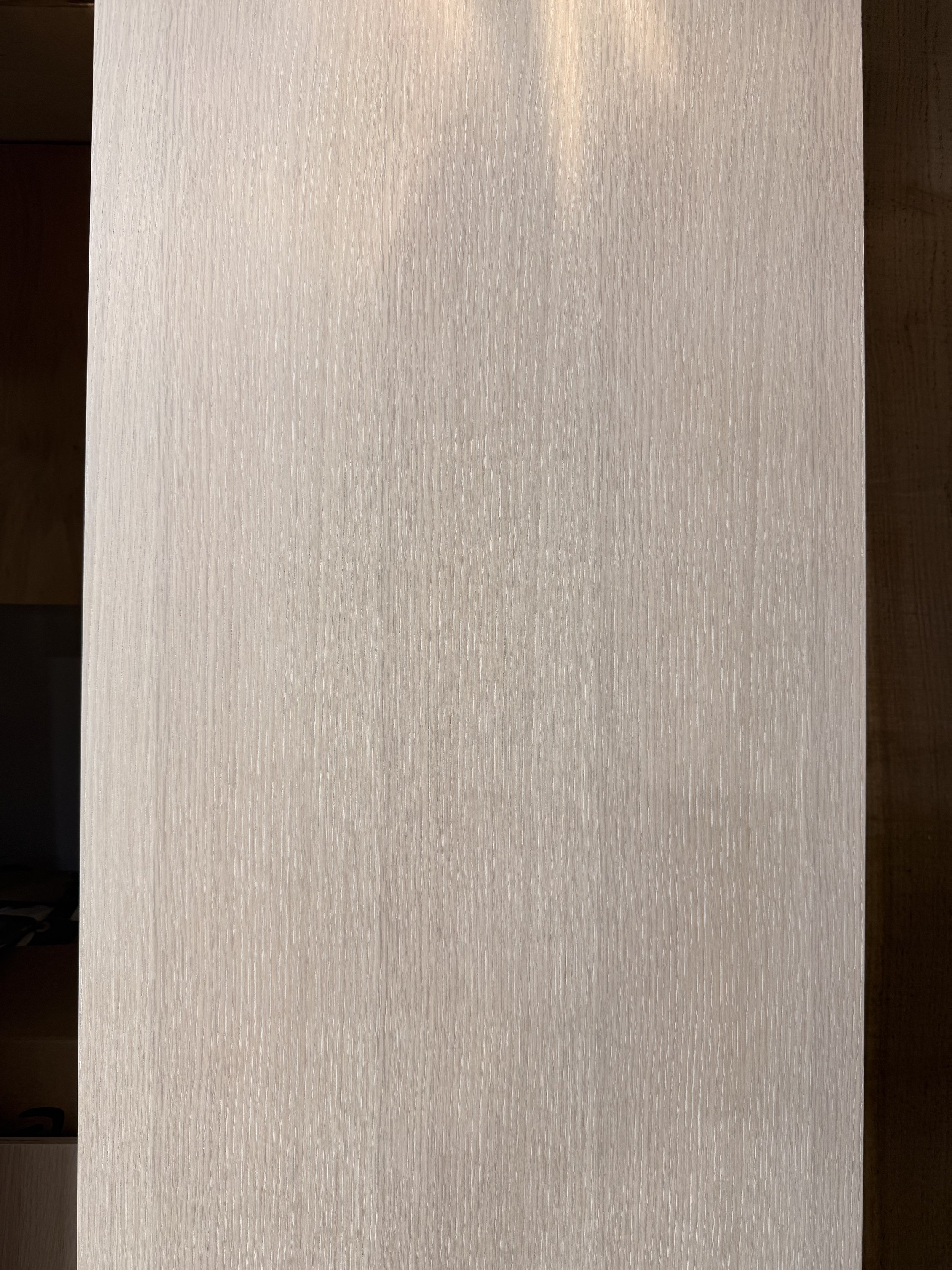 Rift sawn white oak plywood panel finished with Rubio Monocoat White showing light natural tone