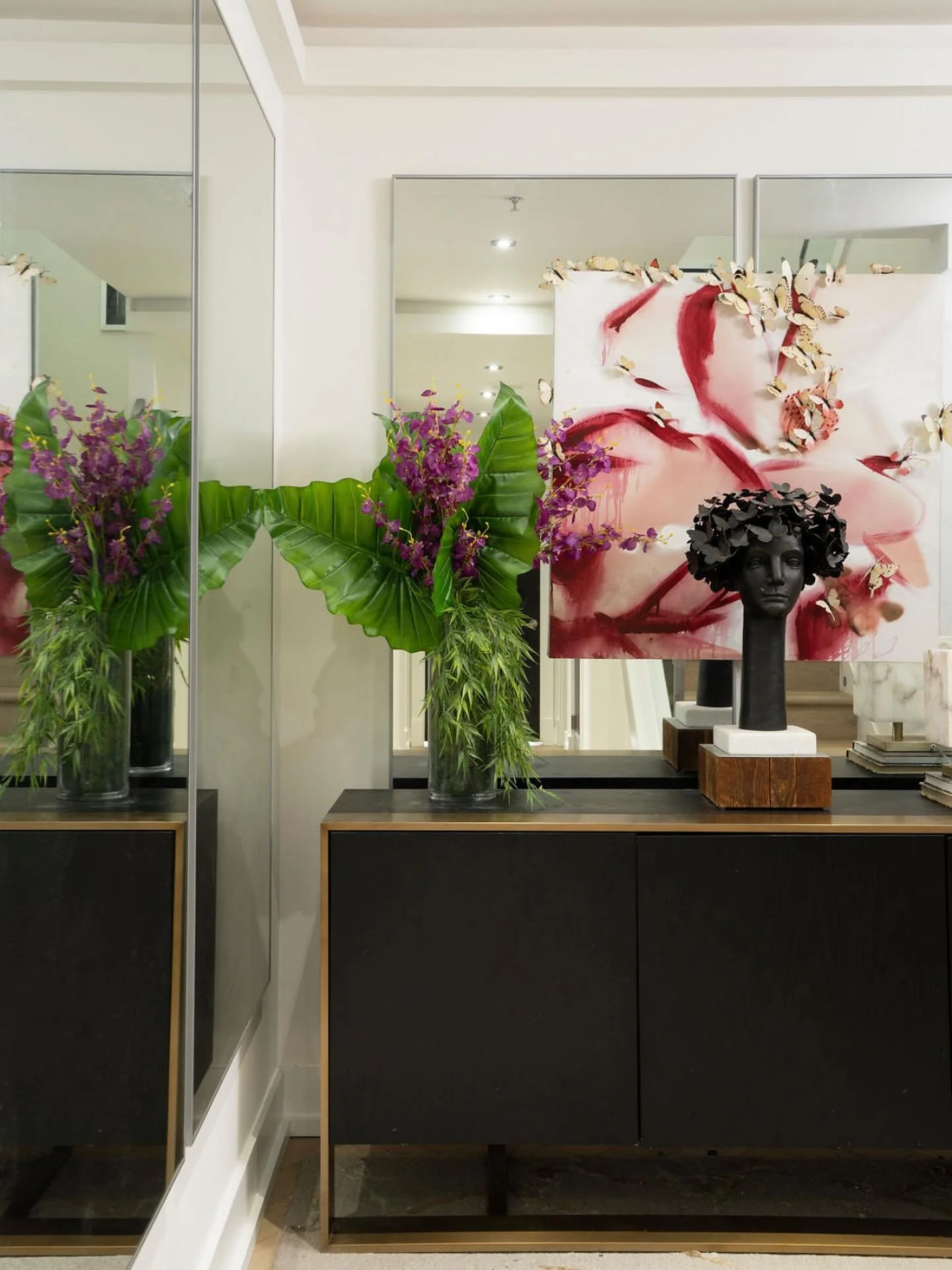 Proving that bold design thrives in the details. Luxe textures and original artwork amplify this vignette, creating a foyer space that feels unforgettable. 

#interiordesign #TesseaMcCrary #houseofluxedesign #modernluxury #entrywayinspo #artmeetsdesi