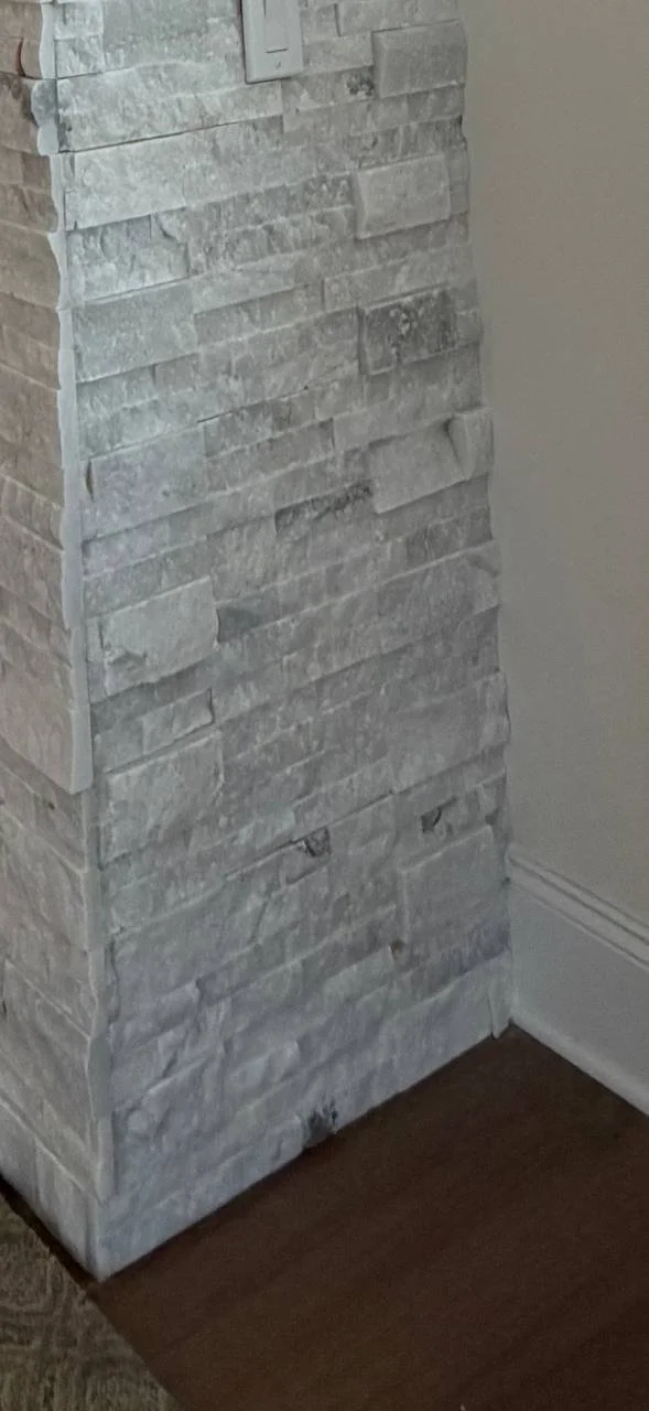 Close-up of split-faced natural marble ledger panel texture, Raleigh NC