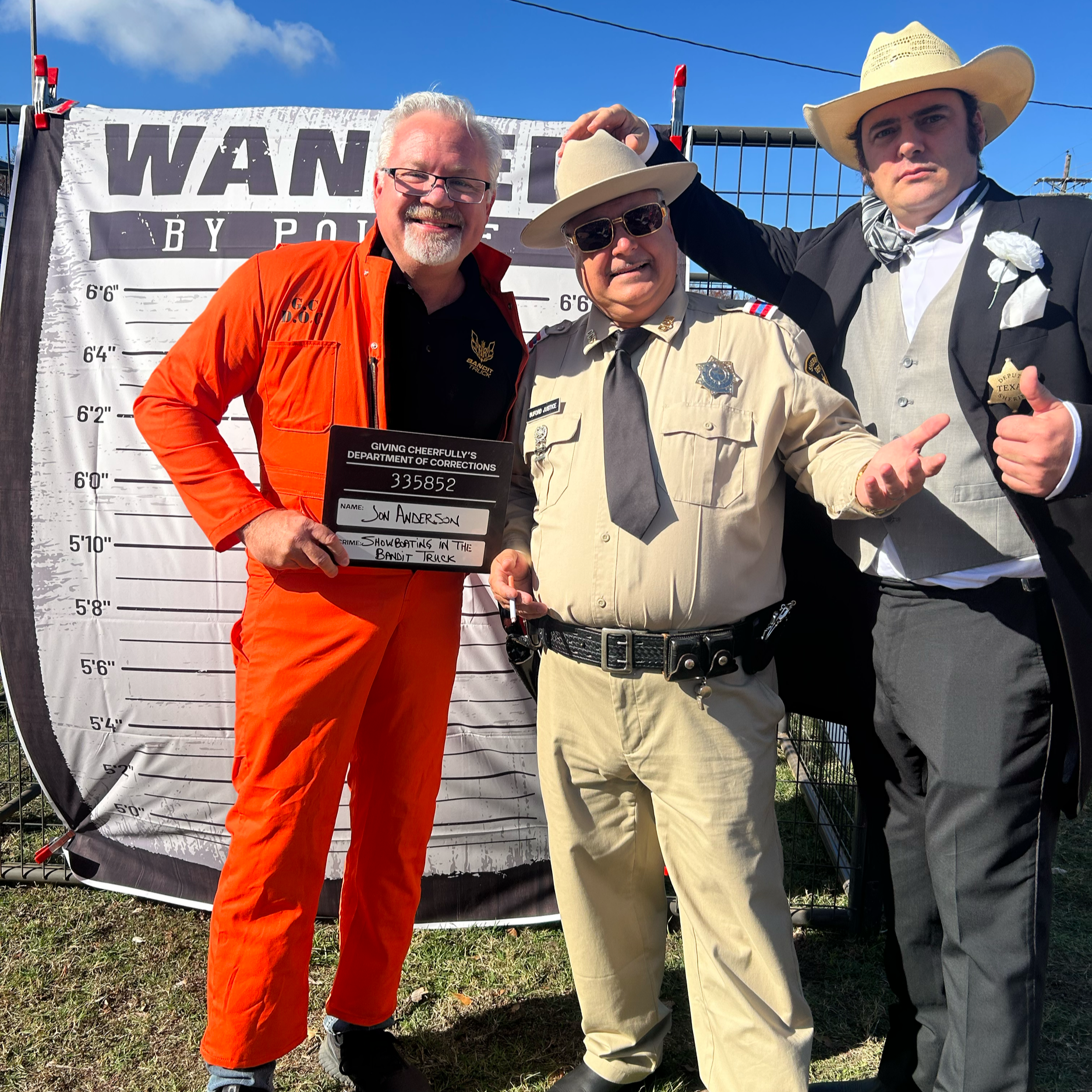 Board President Jon Anderson arrested by Buford T. Justice and Junior at our Jail and Bail fundraiser
