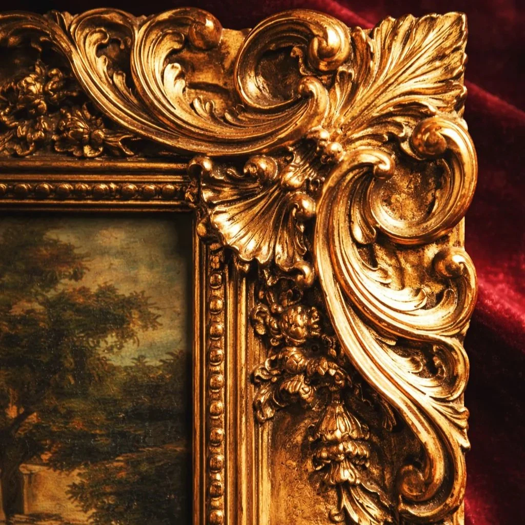 Extreme close-up of museum-quality ornate gilt baroque frame showing intricate hand-carved details and gold leaf craftsmanship