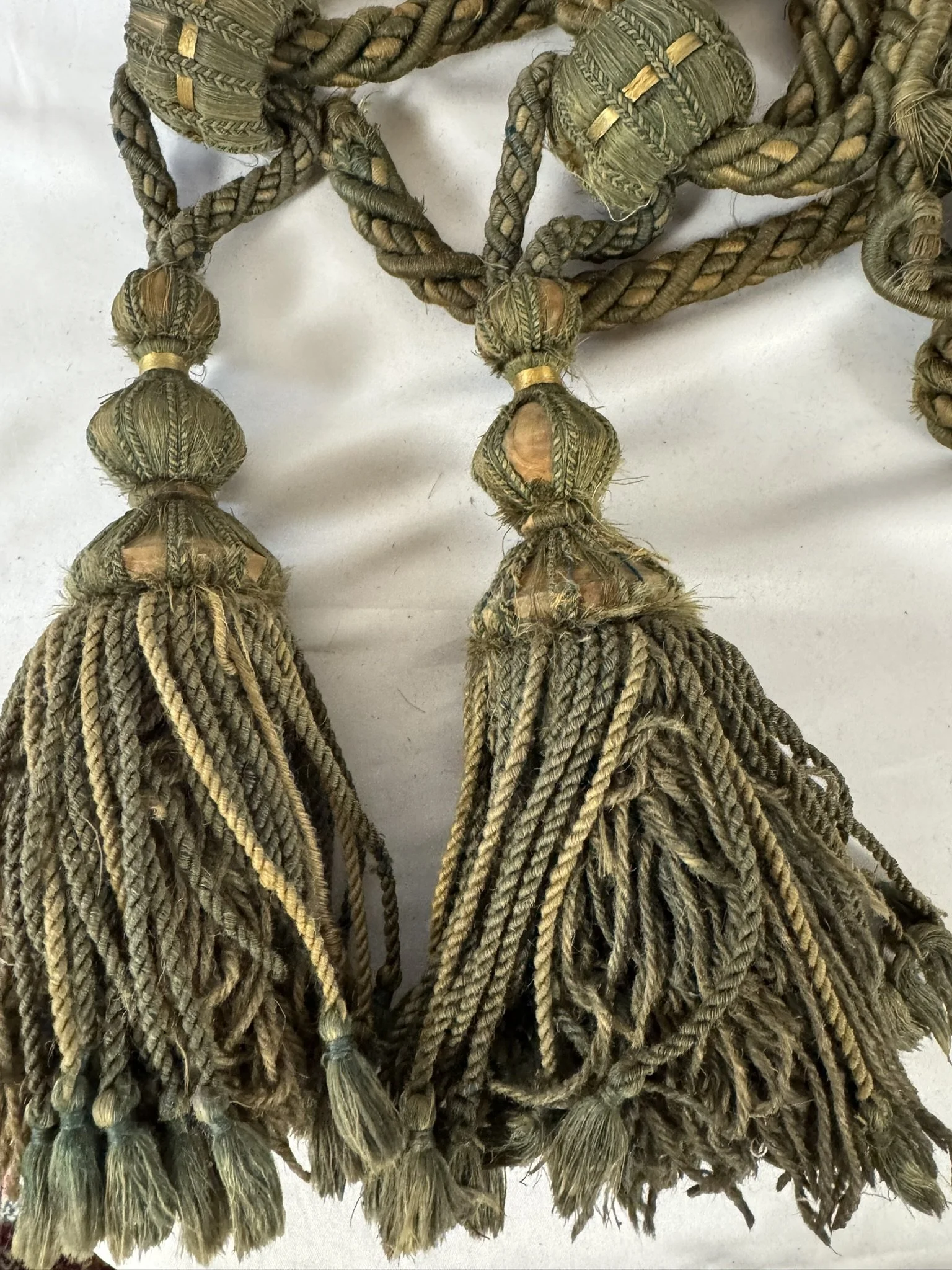 Pair of antique French sage green and gold silk passementerie tassel tiebacks, château find, 19th century
