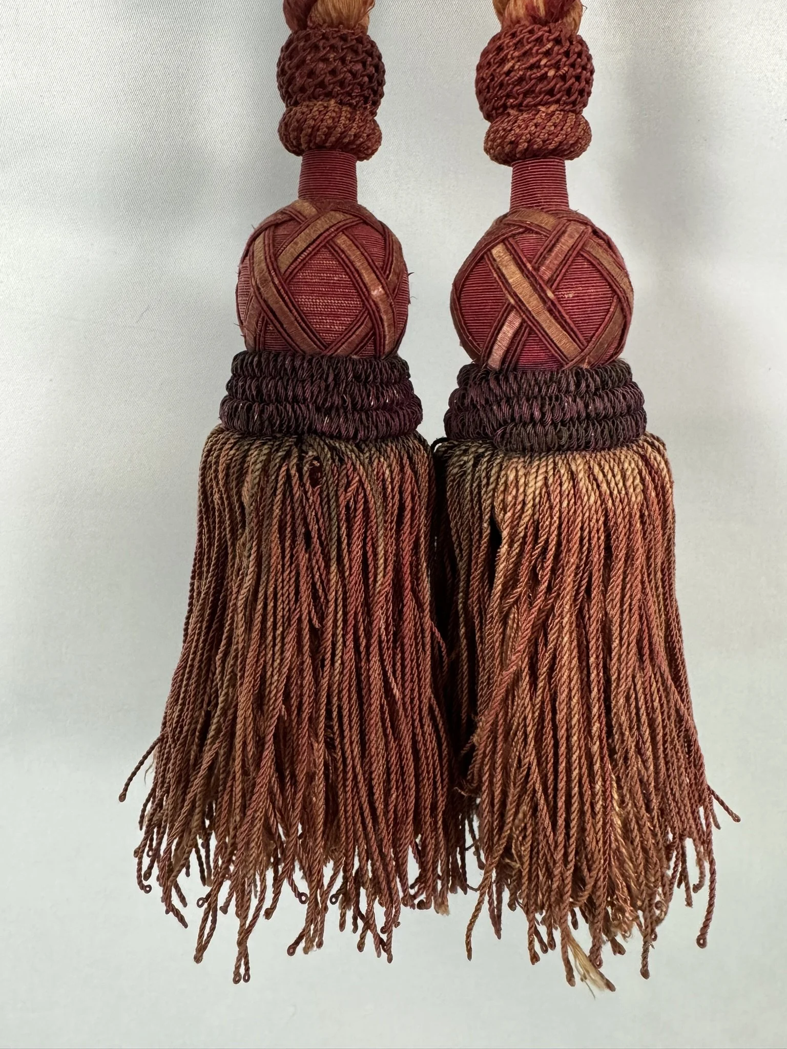Antique French silk passementerie tieback with two lattice-head tassels, rust and gold color-shifting silk