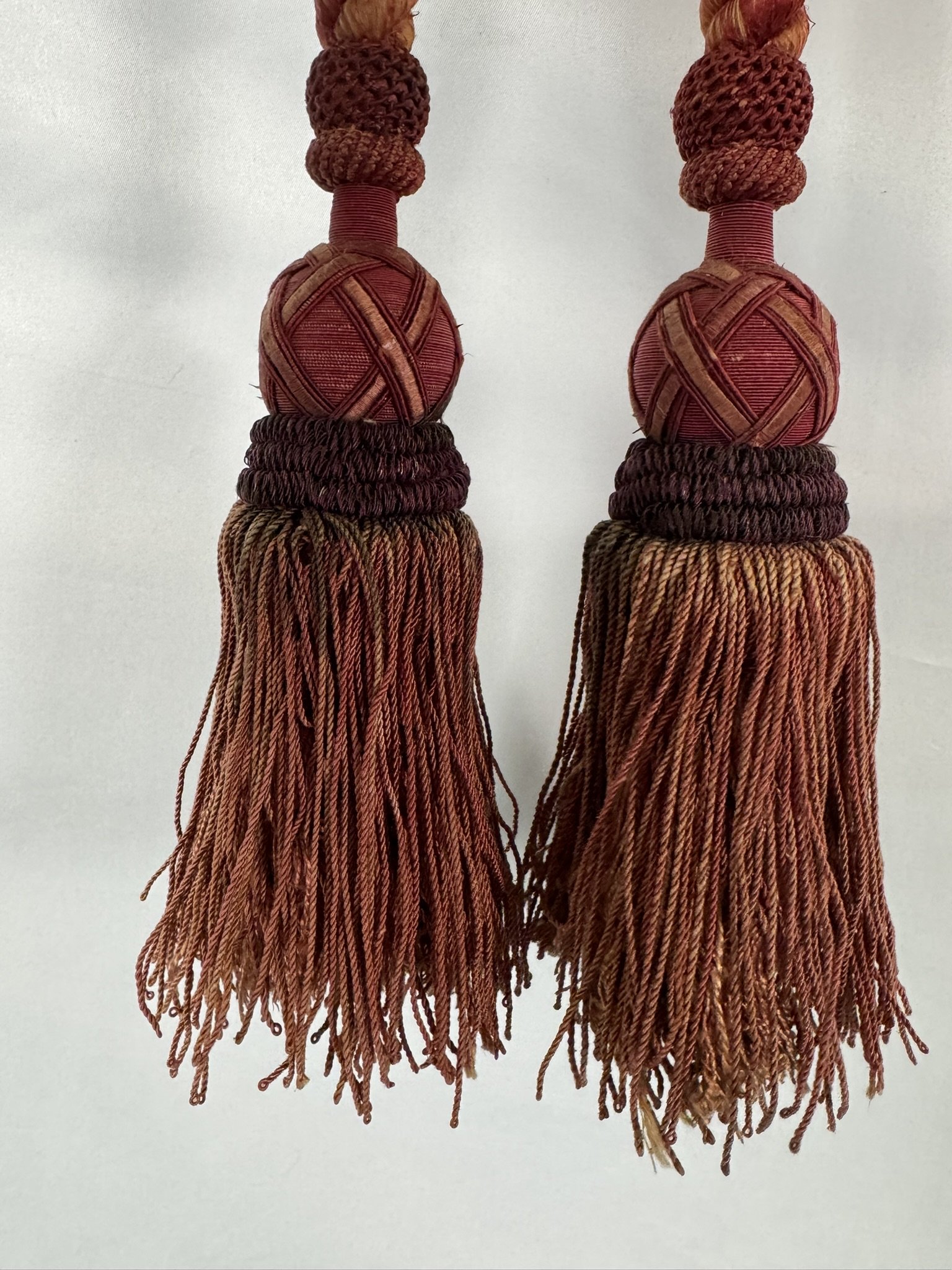 Antique French silk passementerie tieback with two lattice-head tassels, rust and gold color-shifting silk