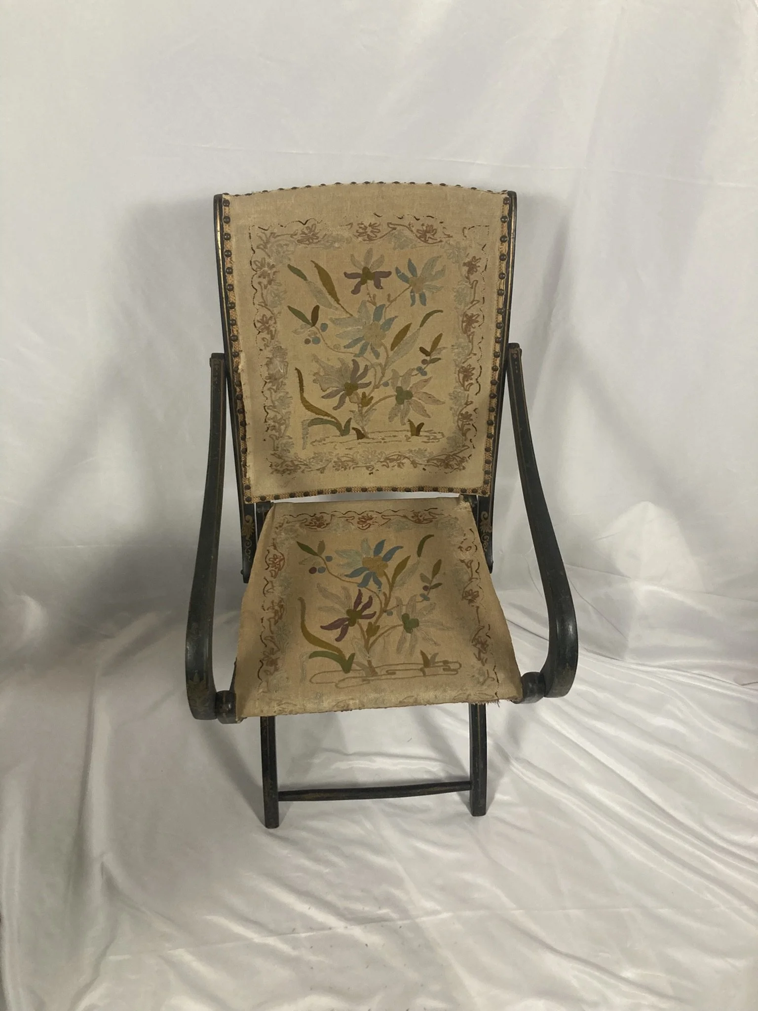 napoleon-iii-folding-armchair-front-view.jpg — "Antique Napoleon III ebonized folding armchair, front view, original crewelwork upholstery, France c.1860"