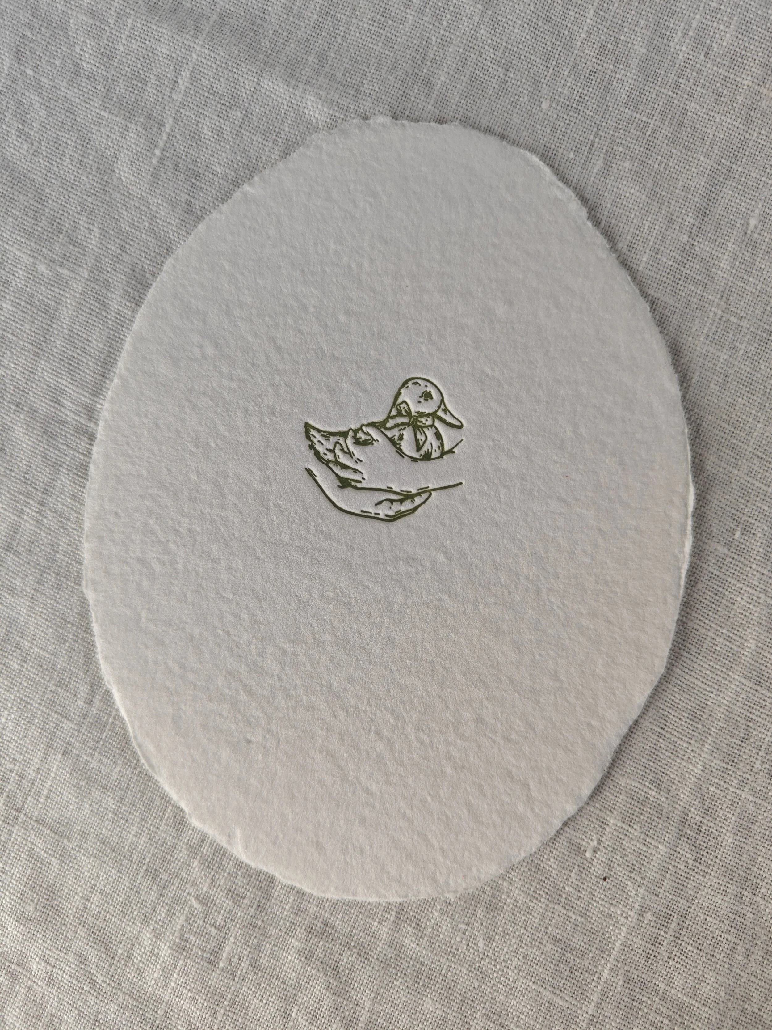 the child holding a duck