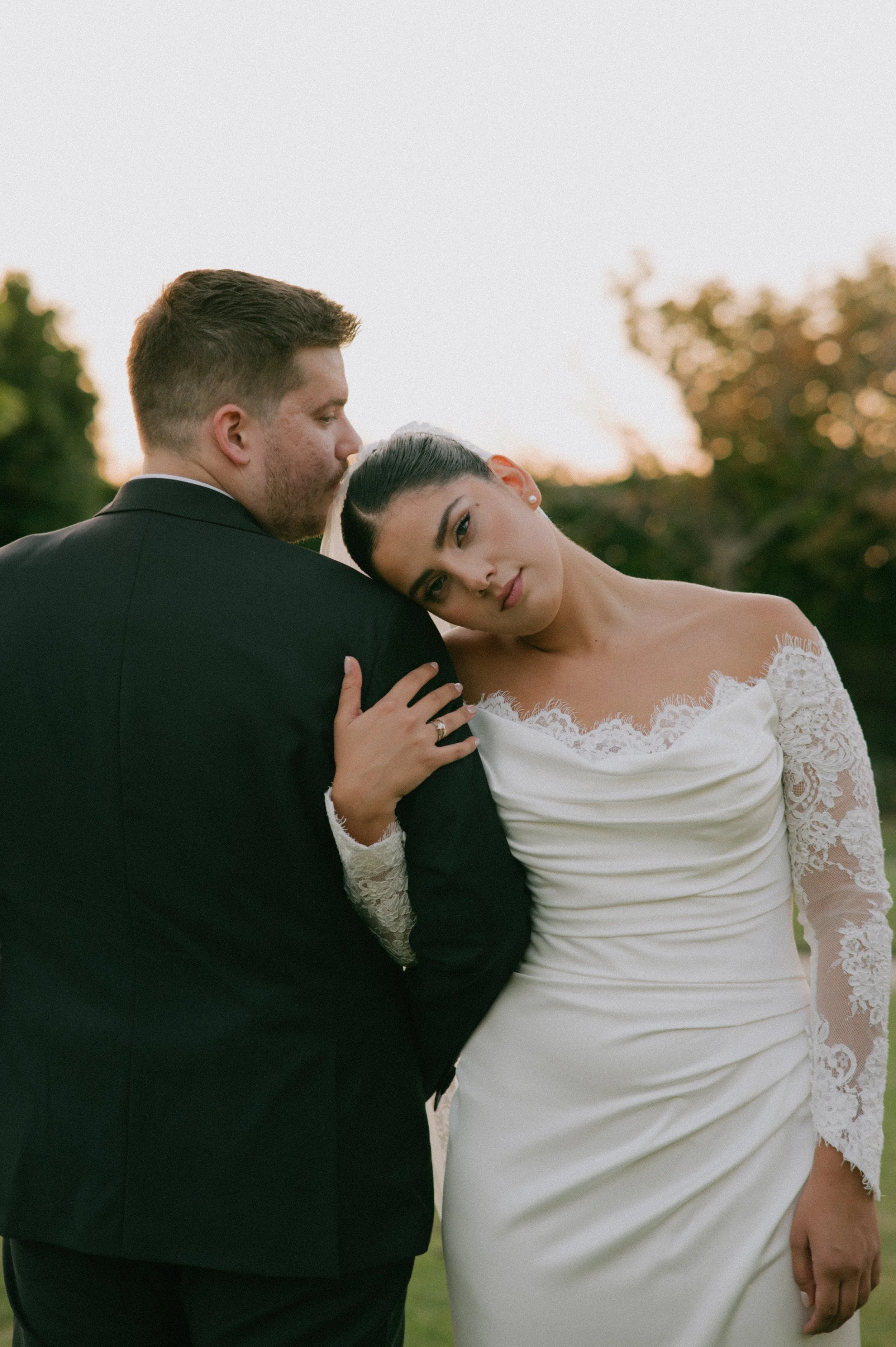 Destination wedding couple hugging after their wedding photoshoot in Greece