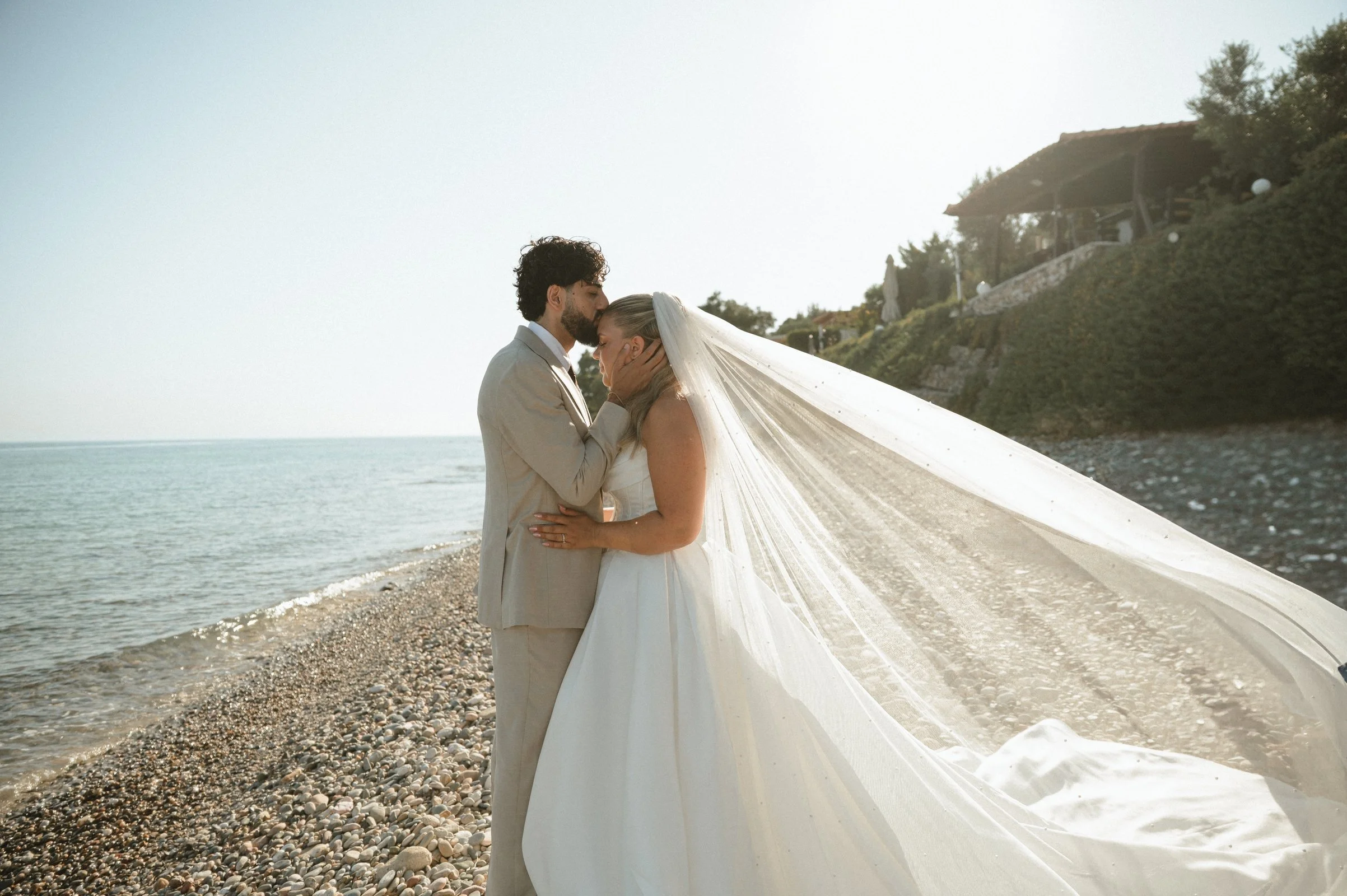 Couple embracing during their Halkidiki destination wedding