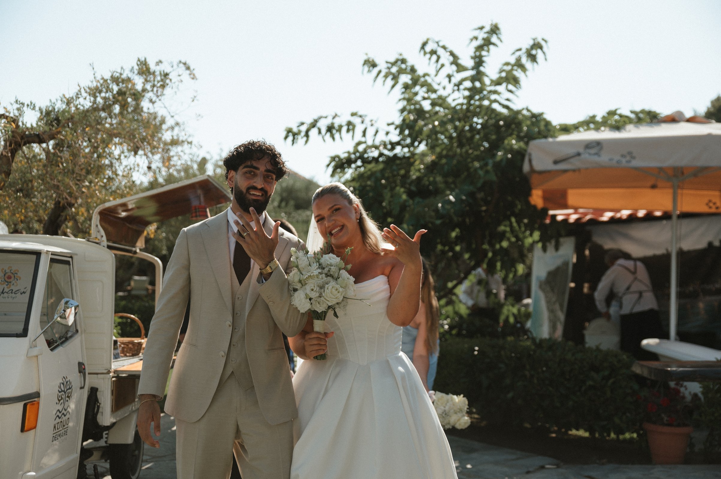 Bride and groom celebrating their destination wedding in Greece