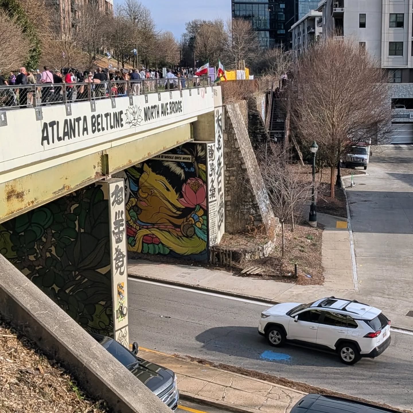 Atlantans want to move around without a car, and the Beltline does a wonderful job of proving it! The crowds today were impressive. 

But look at the empty sidewalks on the streets below the path -- apparently we need better conditions on our streets