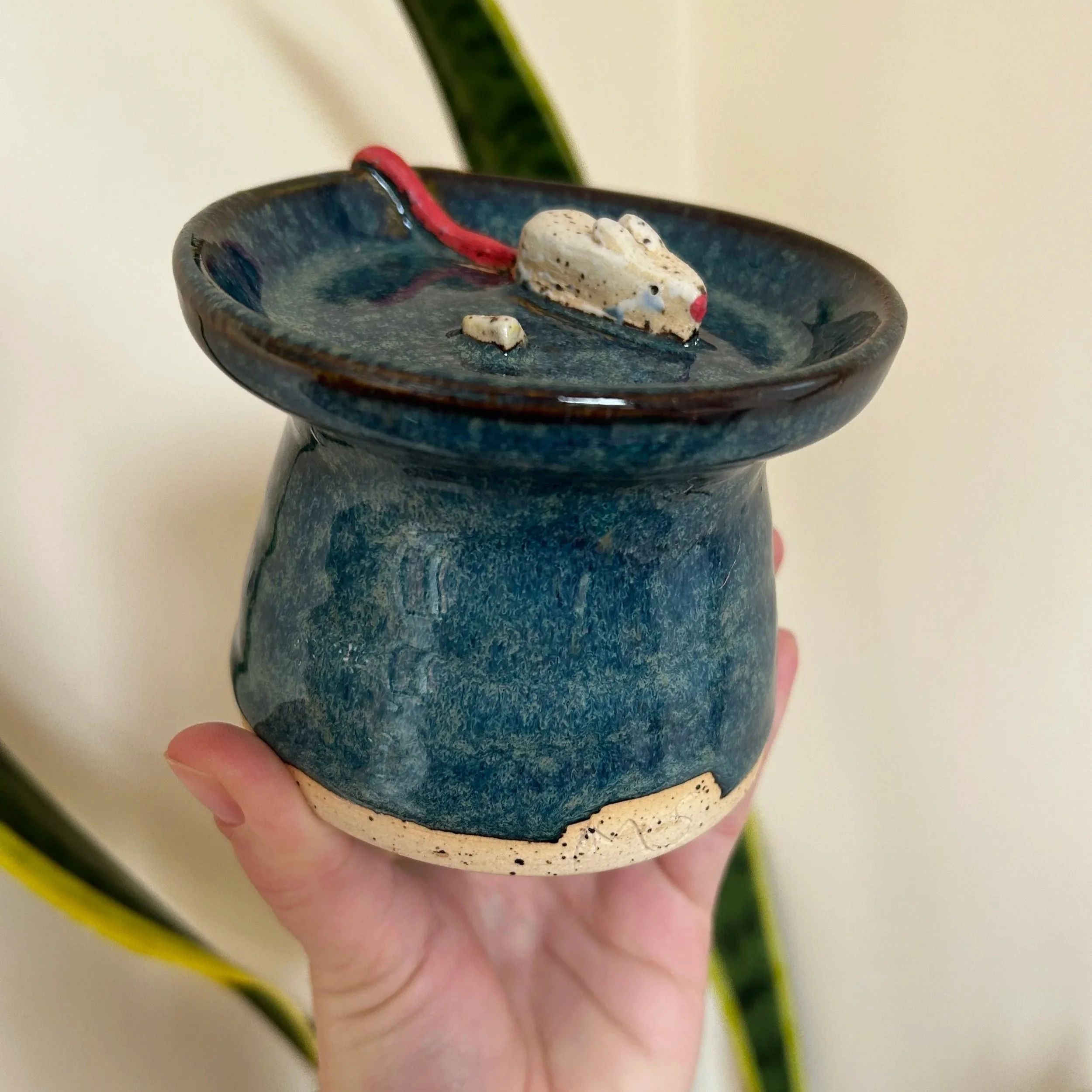 Glazed slow feeder, $30