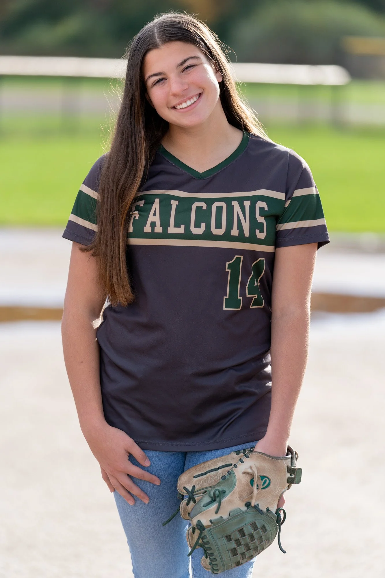 high school senior portrait wearing Falcons shirt