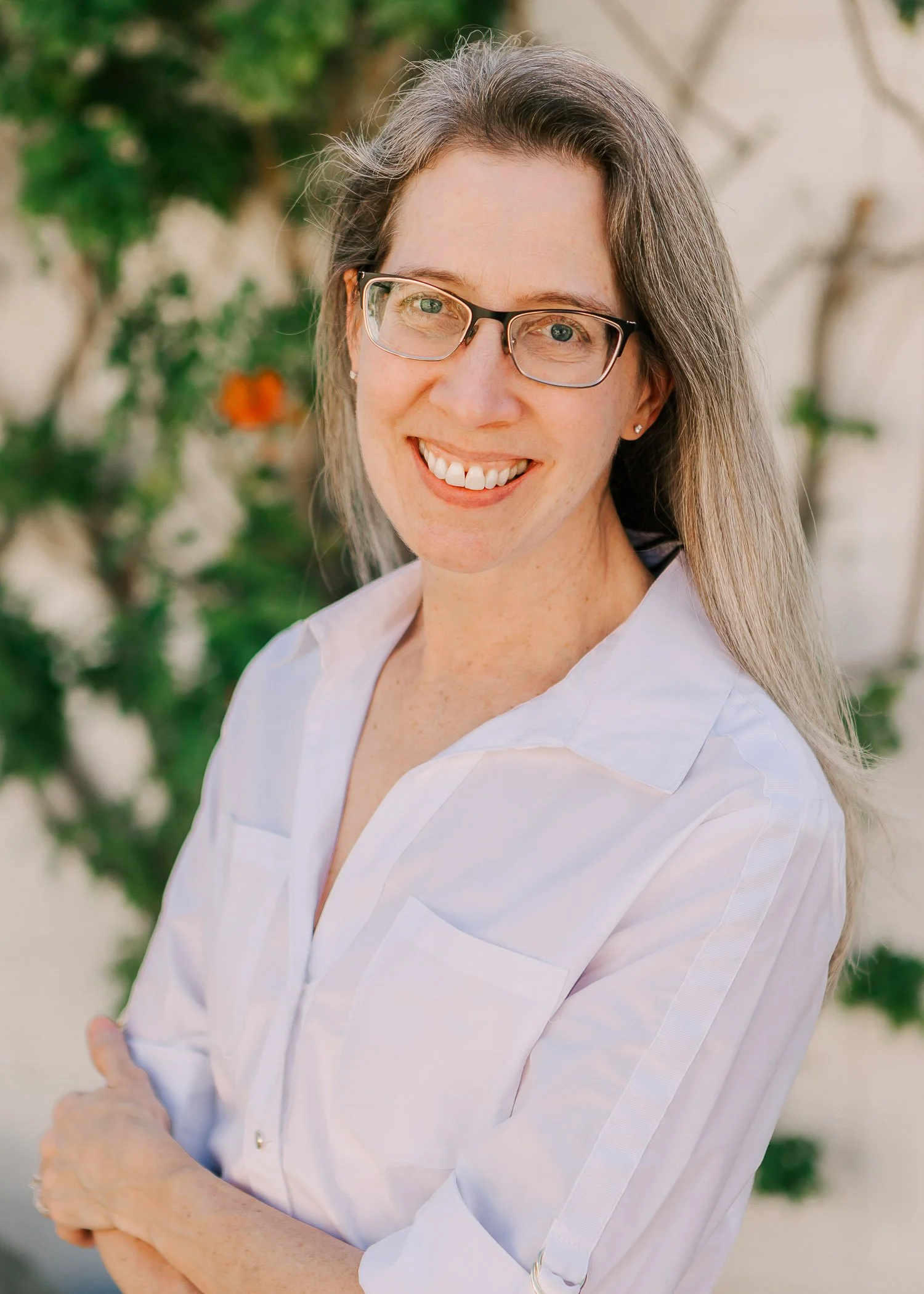 Jennifer Banks portrait smiling wearing white shirt