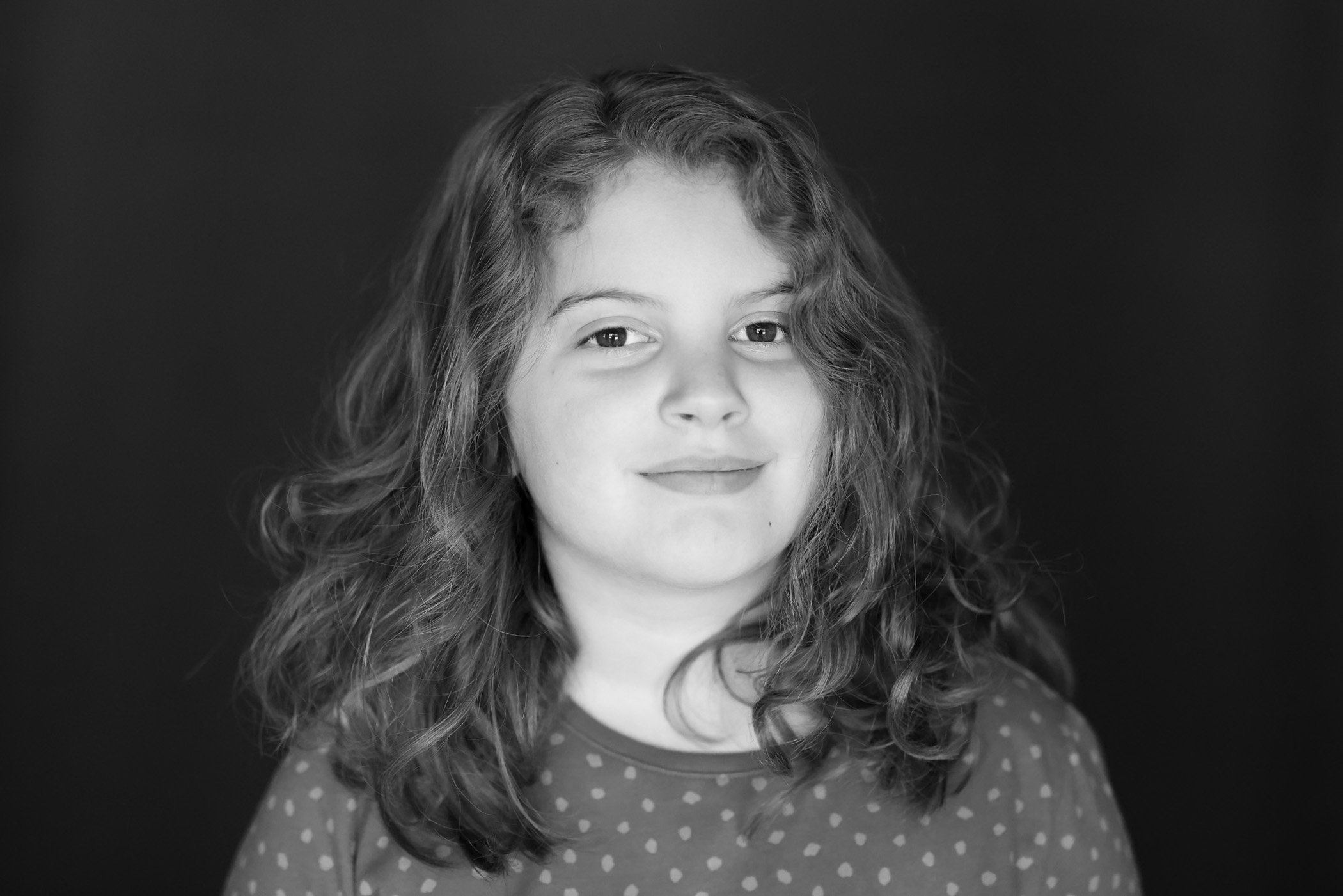 black and white of serious young girl