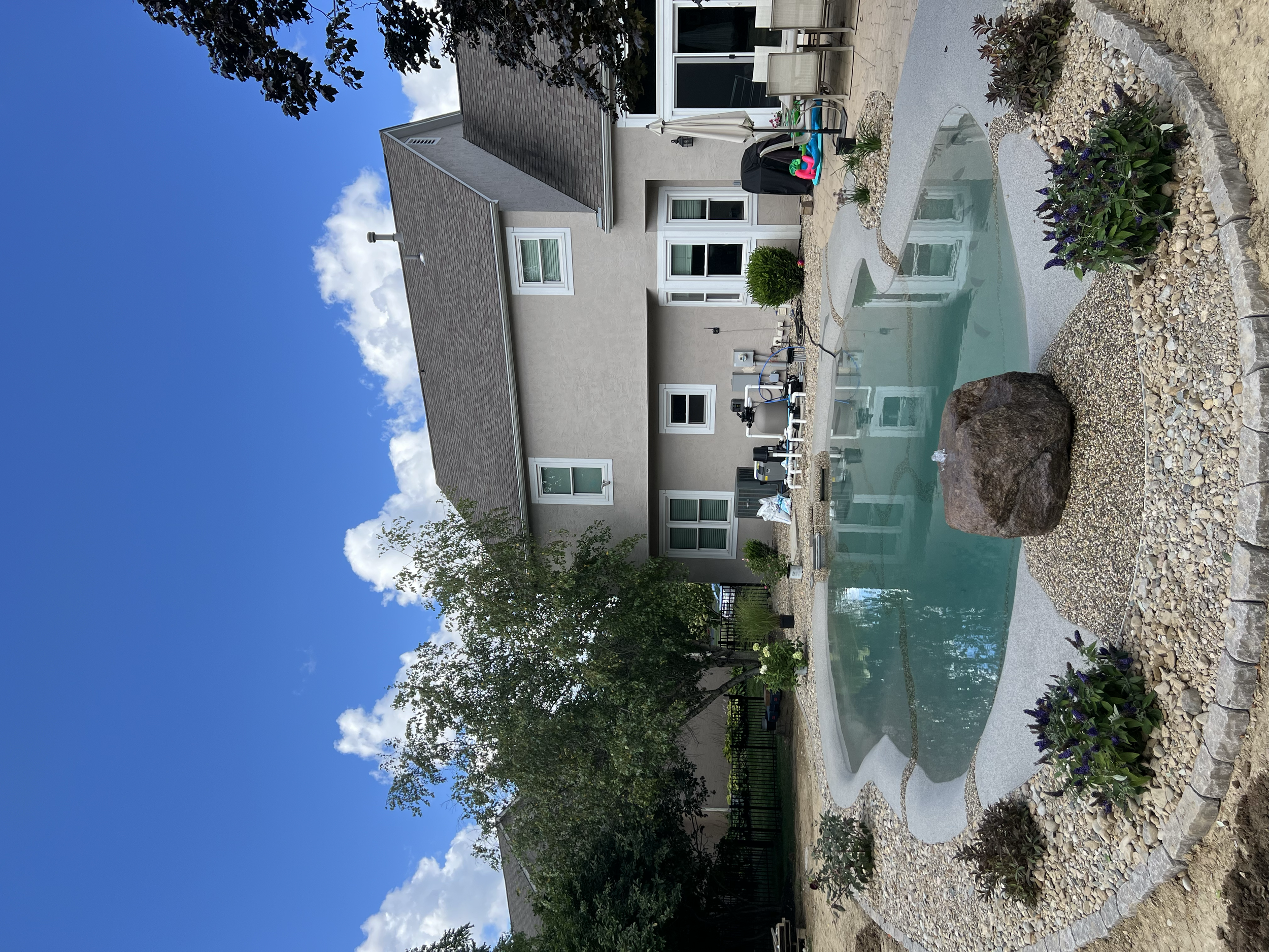 Completed backyard with a biodesign pool.
