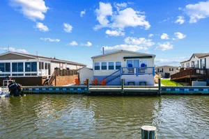 Just Listed: Waterfront Home with Private Dock in Mariners Cove, Delaware