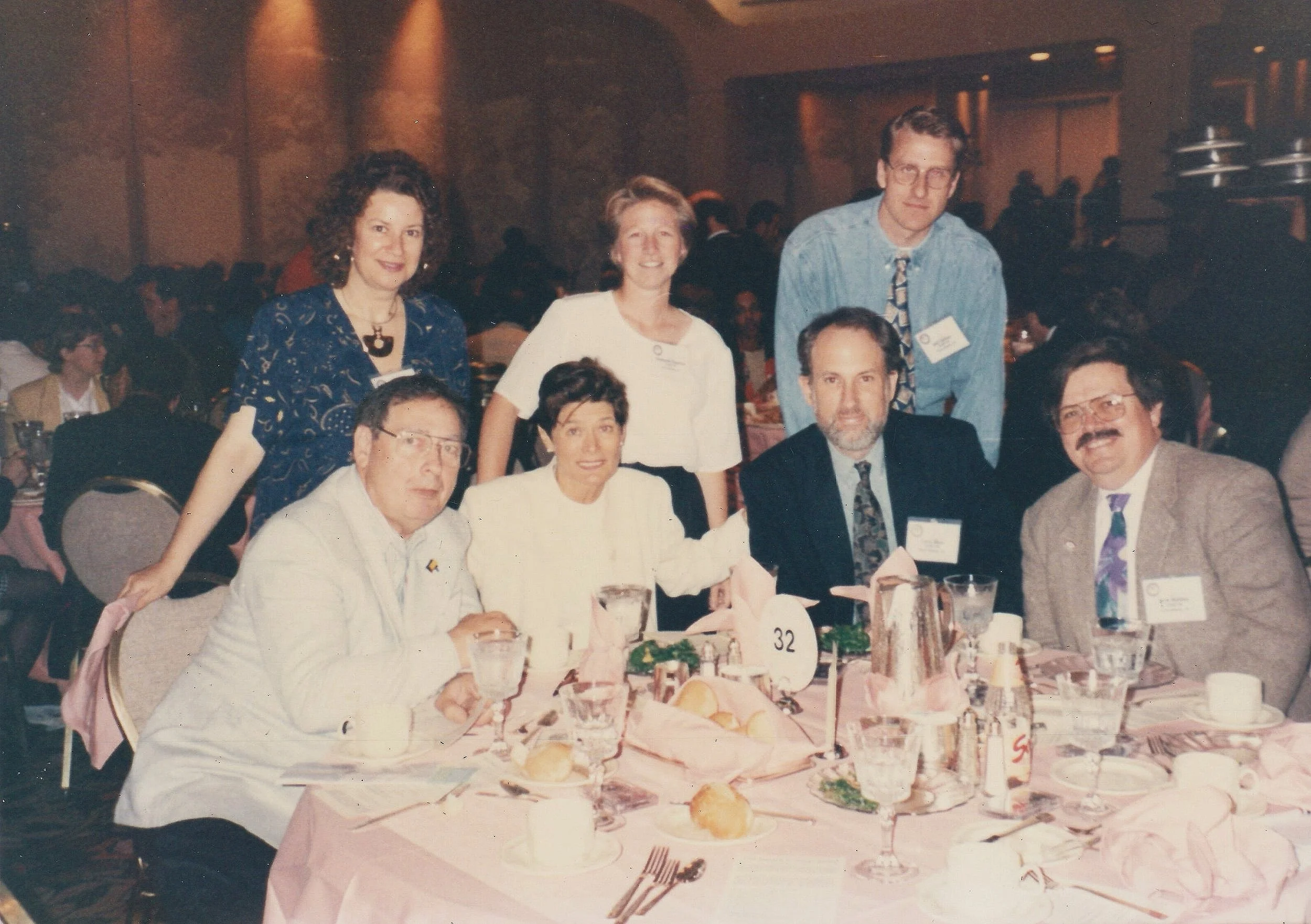 Staff at a Public Radio Conference (1987-88?). Top Clockwise: Sarah Spitz, Stephanie Engelsen, Bob Carlson, John Huntley, Larry Stein, Ruth & Will Lewis