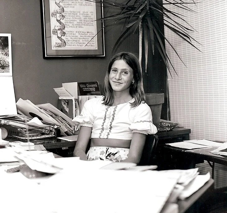 Celia at Ruth's desk at KPFK age 14