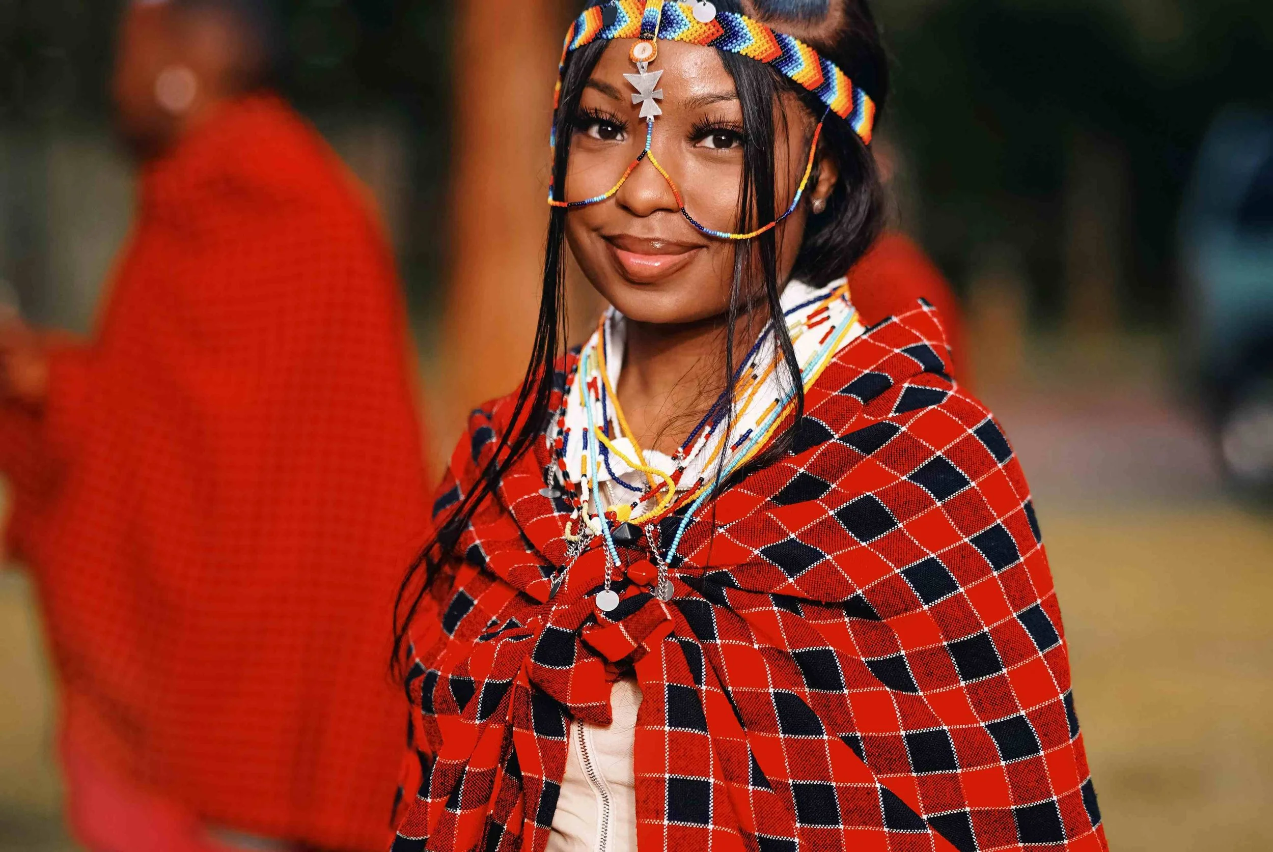 A Kenyan woman dressed in their traditional attire