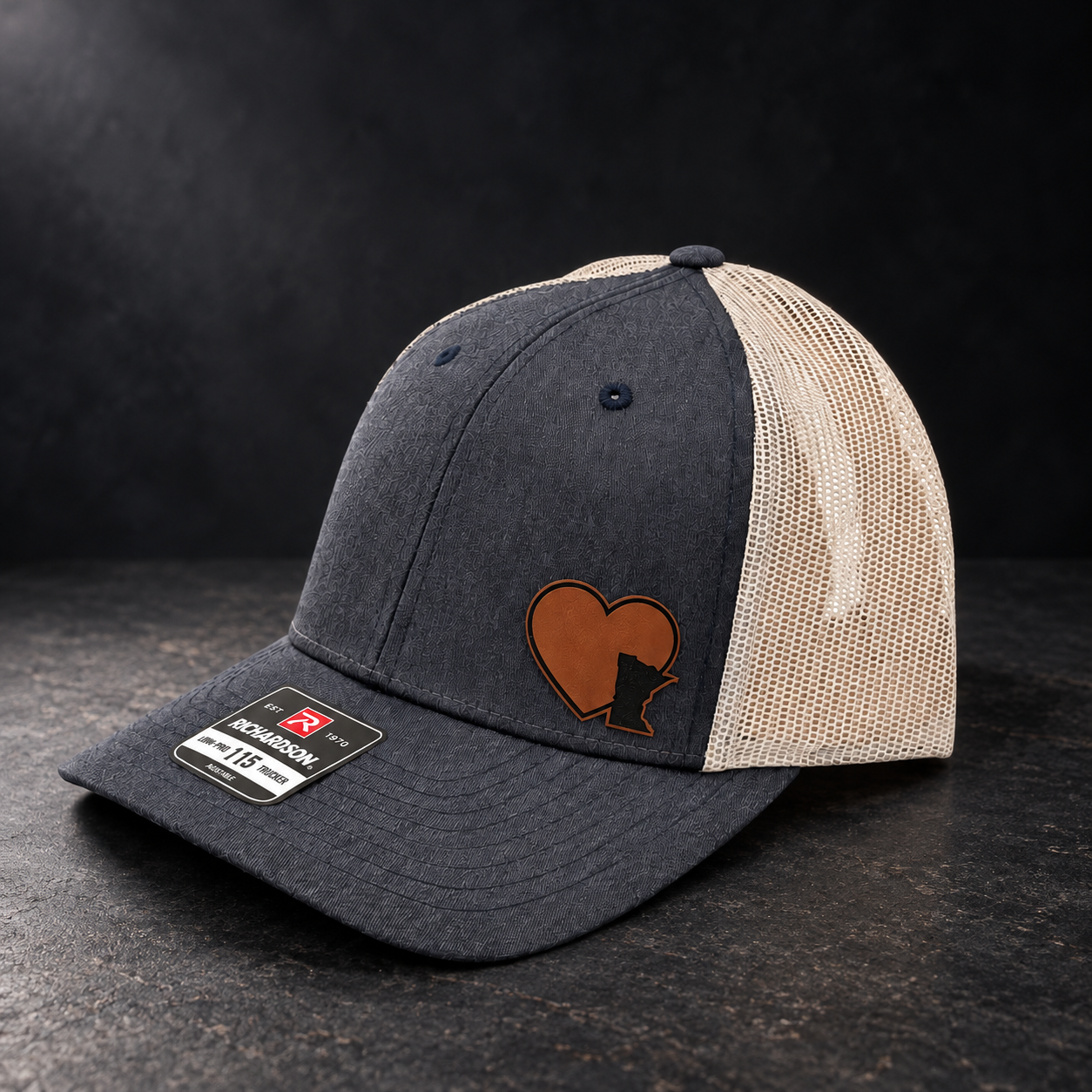 Charcoal Trucker Hat in Dark Studio.png