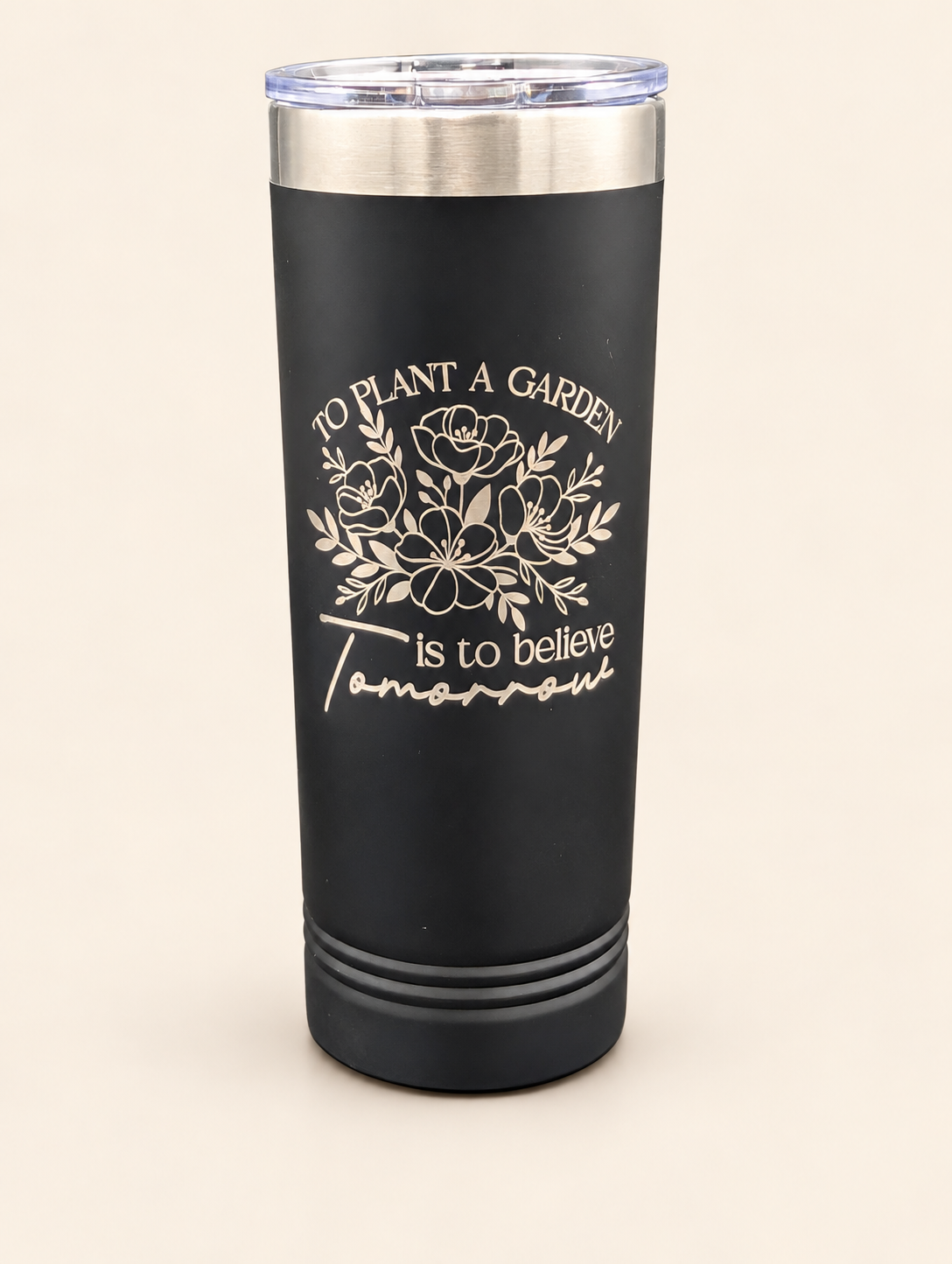 Engraved floral tumbler on warm ivory.png