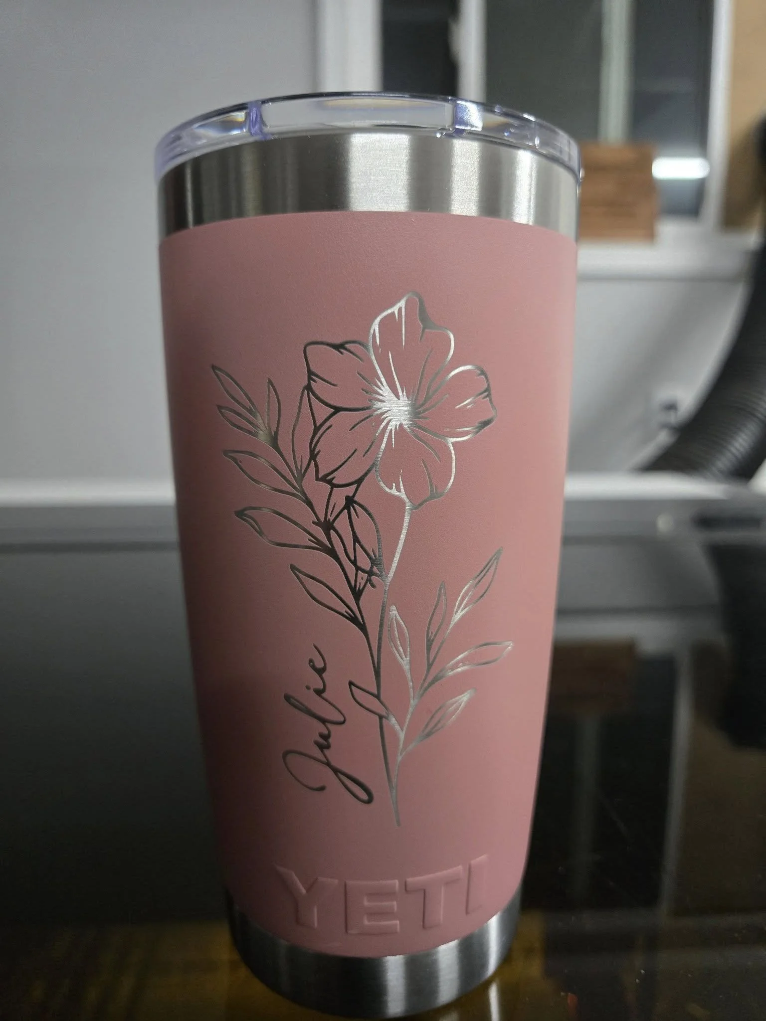 Pink YETI tumbler with floral design