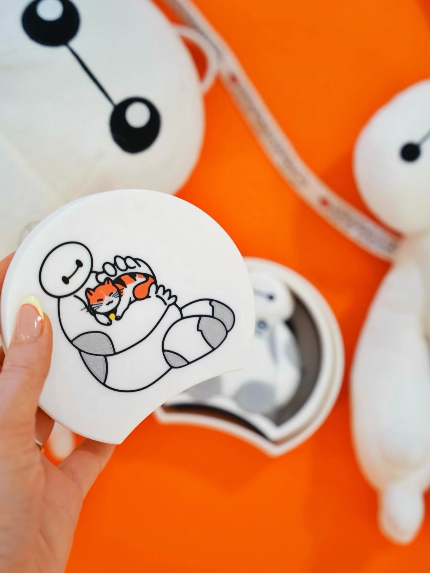 HAIRY 🧡 BEBE 🐾 &bull;
All the love for this lil cat and his personal healthcare companion 🤭 we knew we had to incorporate Mochi into this collection and yall went bananas for it! The idea of Mochi running around the parks with Baymax and then star