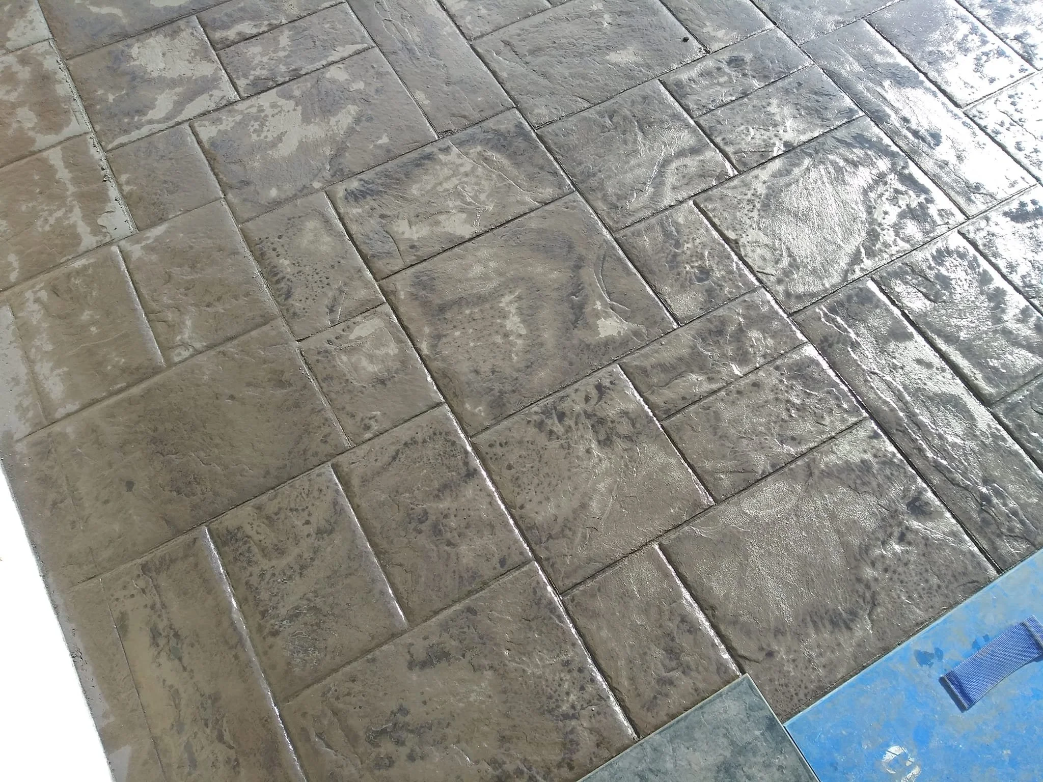 Oranssi technician working on a roof project