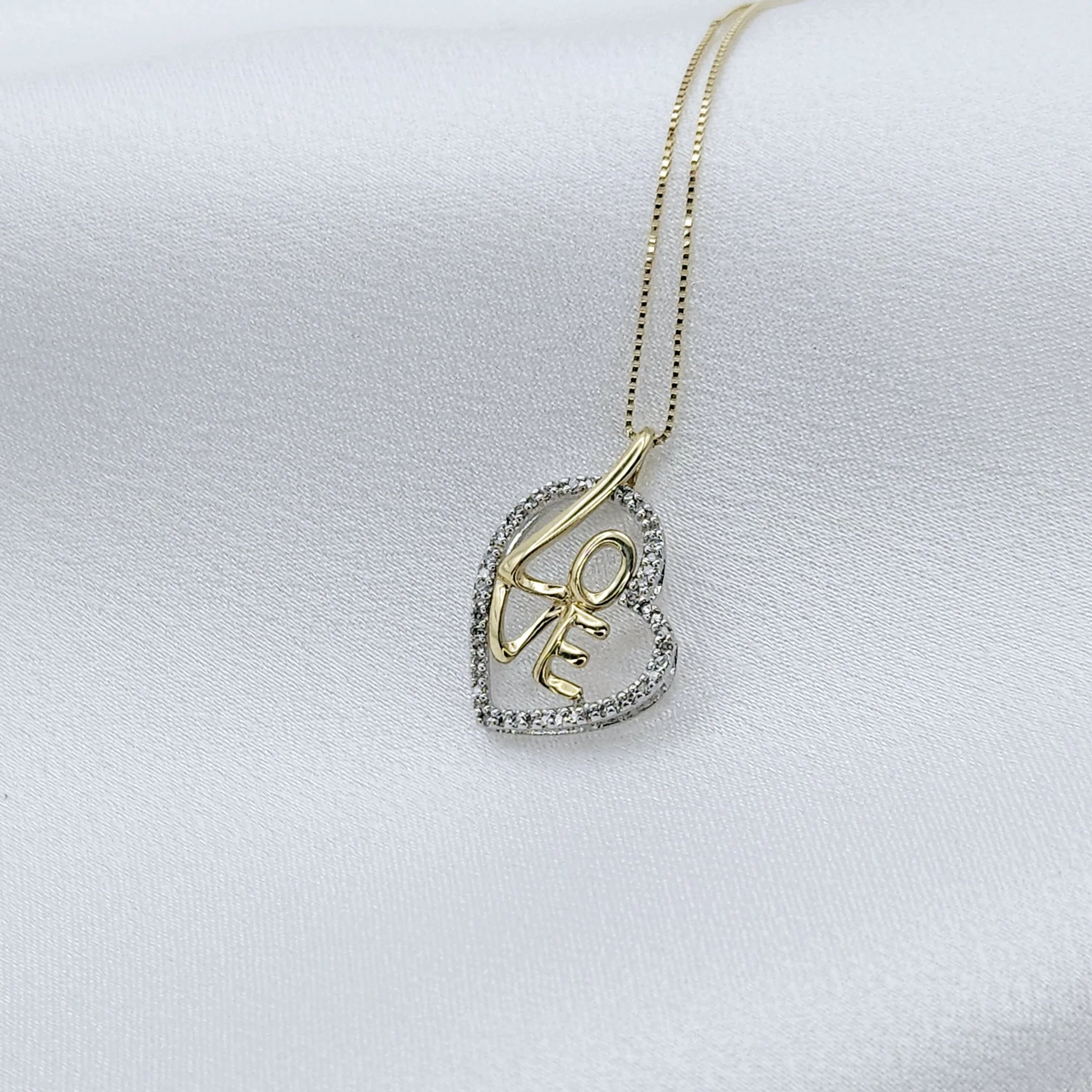 Two-Tone Diamond "Love" Pendant (.25 CWT)