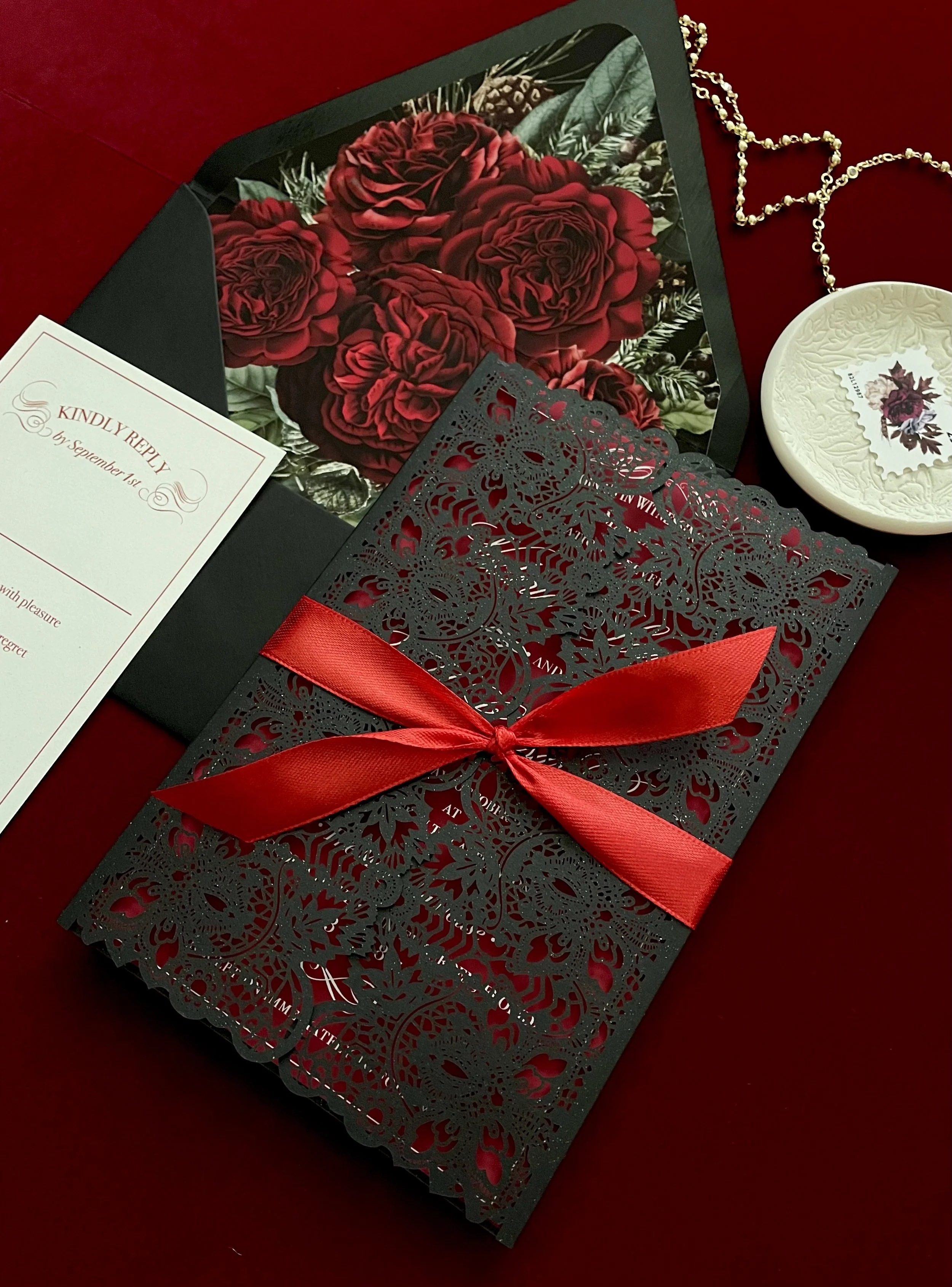 bold-red-wedding-invitation-with-black-lace-pocket-fold.jpeg
