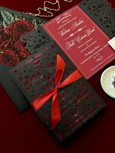 elegant-laser-cut-wedding-invitation-red-ribbon-detail.jpeg