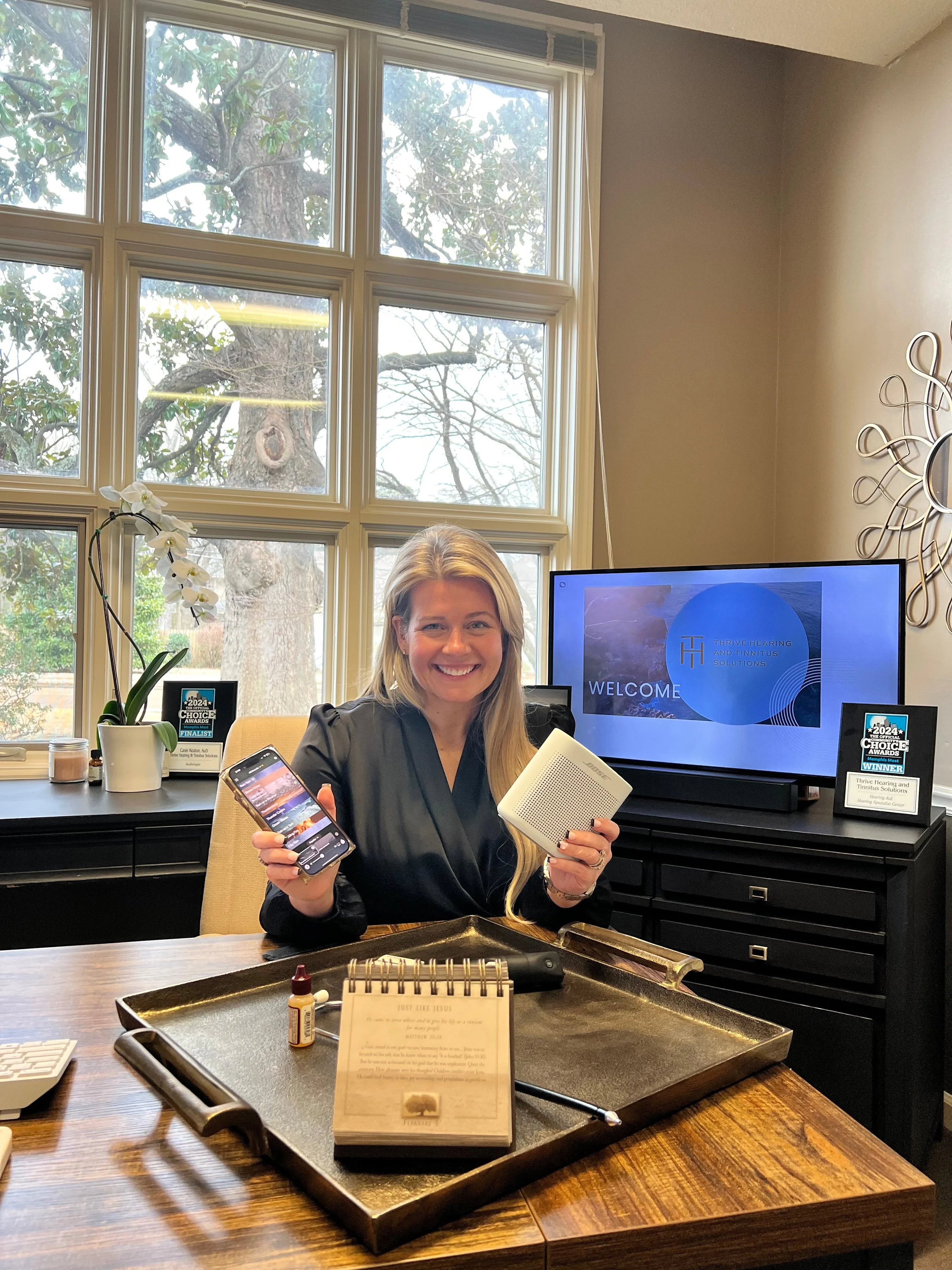 Patient receiving a tinnitus assessment, representing tinnitus evaluation and treatment at Thrive Hearing and Tinnitus Solutions in Memphis.