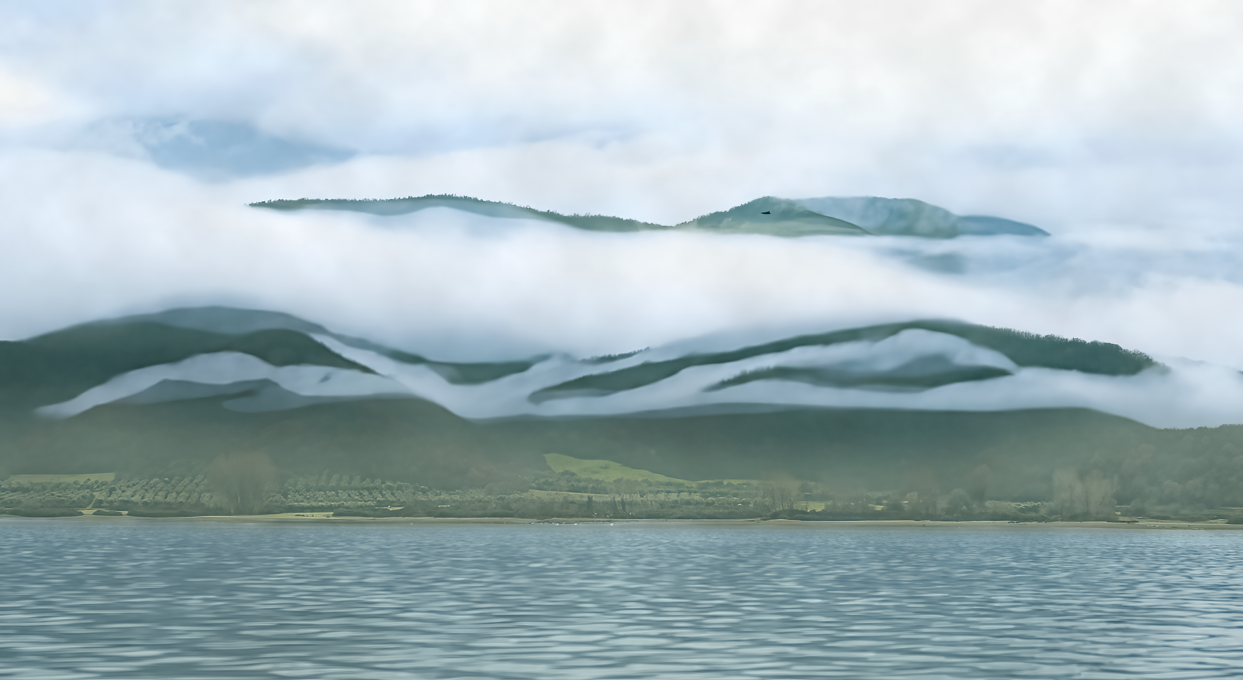 Lake Kerkini and Hills  in Greece Shoreline in Fog
