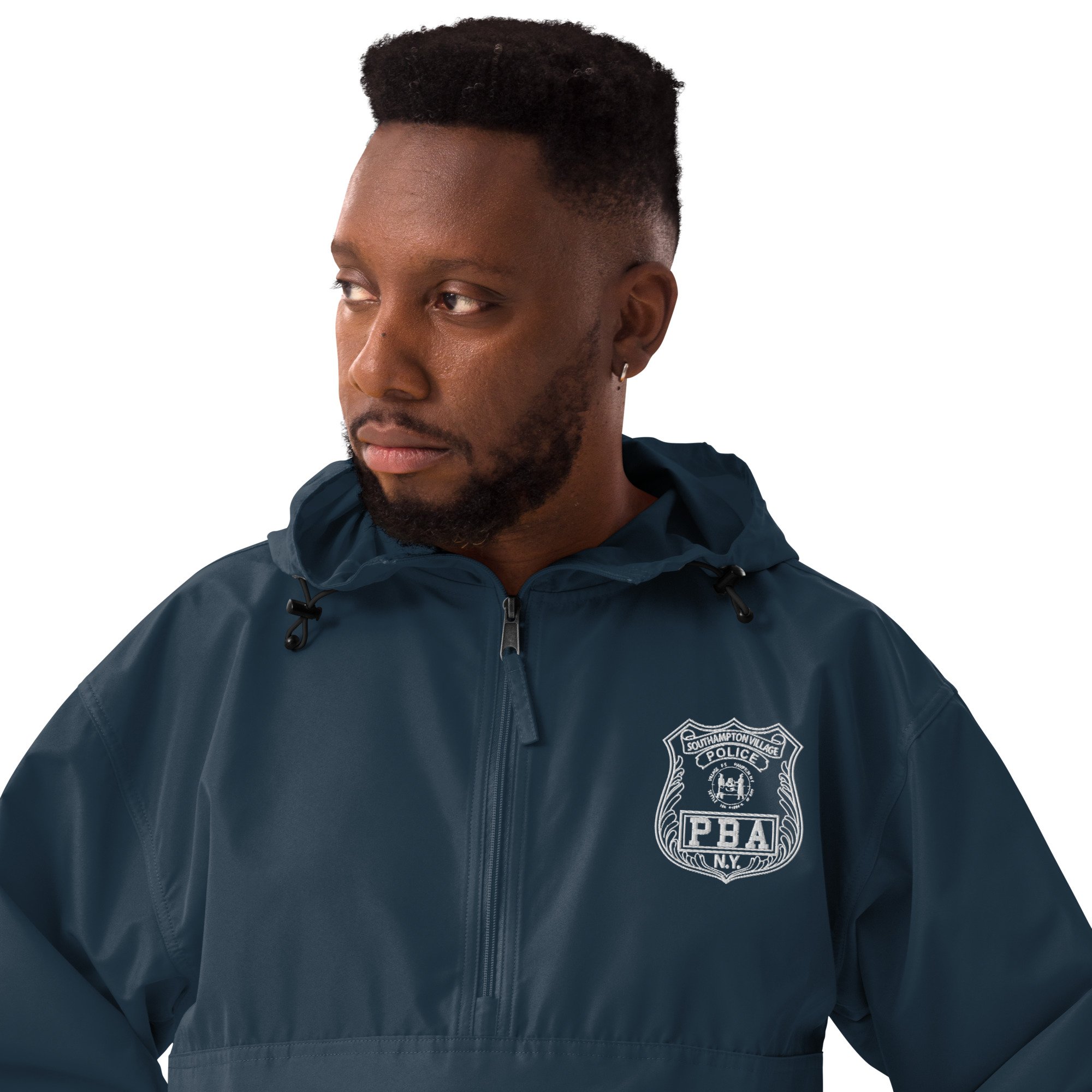 embroidered-champion-packable-jacket-navy-zoomed-in-66a8f47e7f98b.jpg