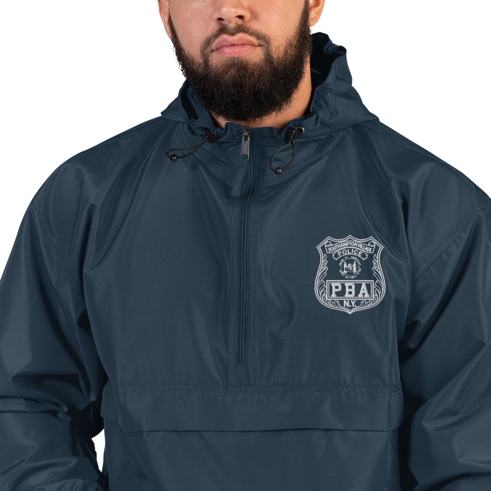 embroidered-champion-packable-jacket-navy-zoomed-in-66a8f47e7ff12.jpg