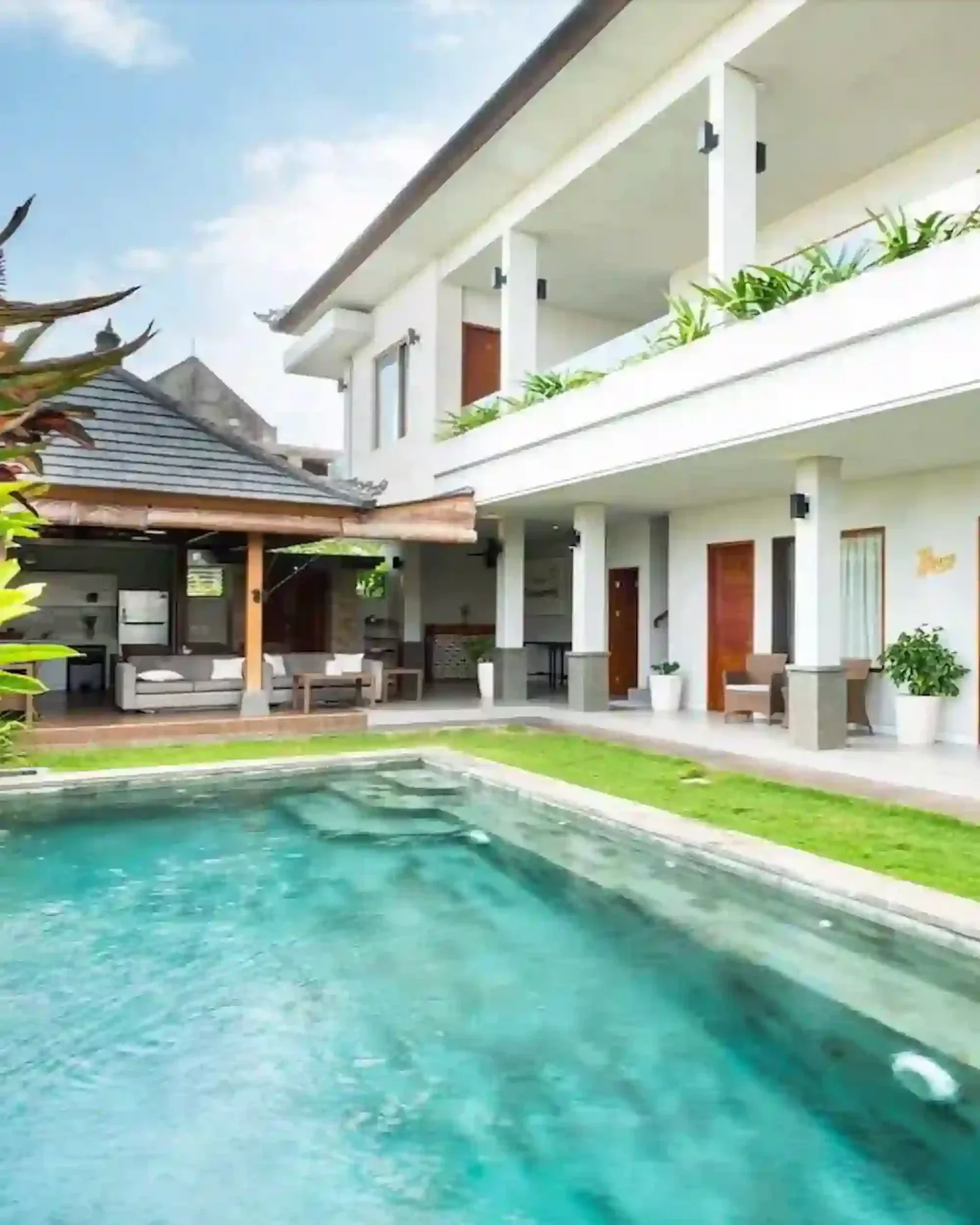 view of Bali Harmony Rehab overlooking the inviting pool across to guest rooms and guest lounge dining area