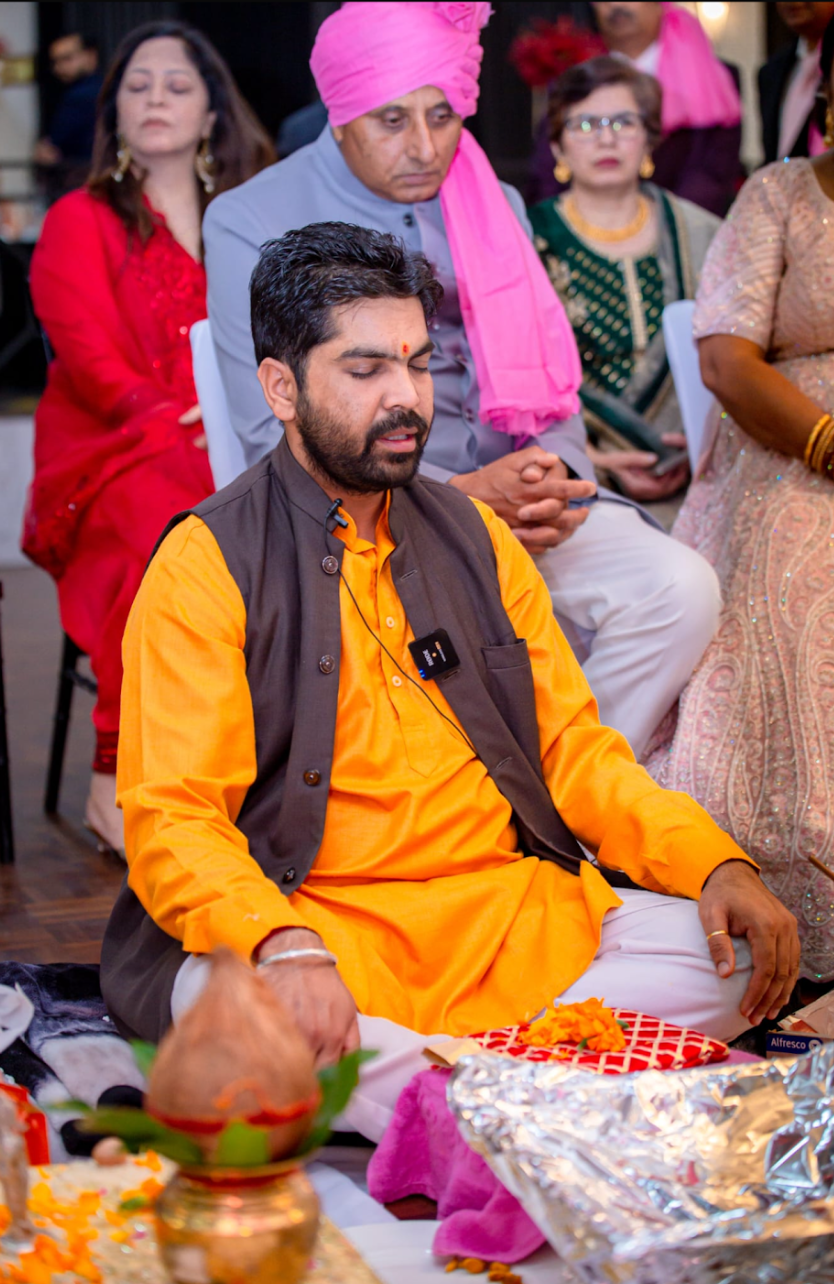 Hindu Pandit Acharya Raj leading a Bhoomi Pooja ceremony for a new home in Melbourne.