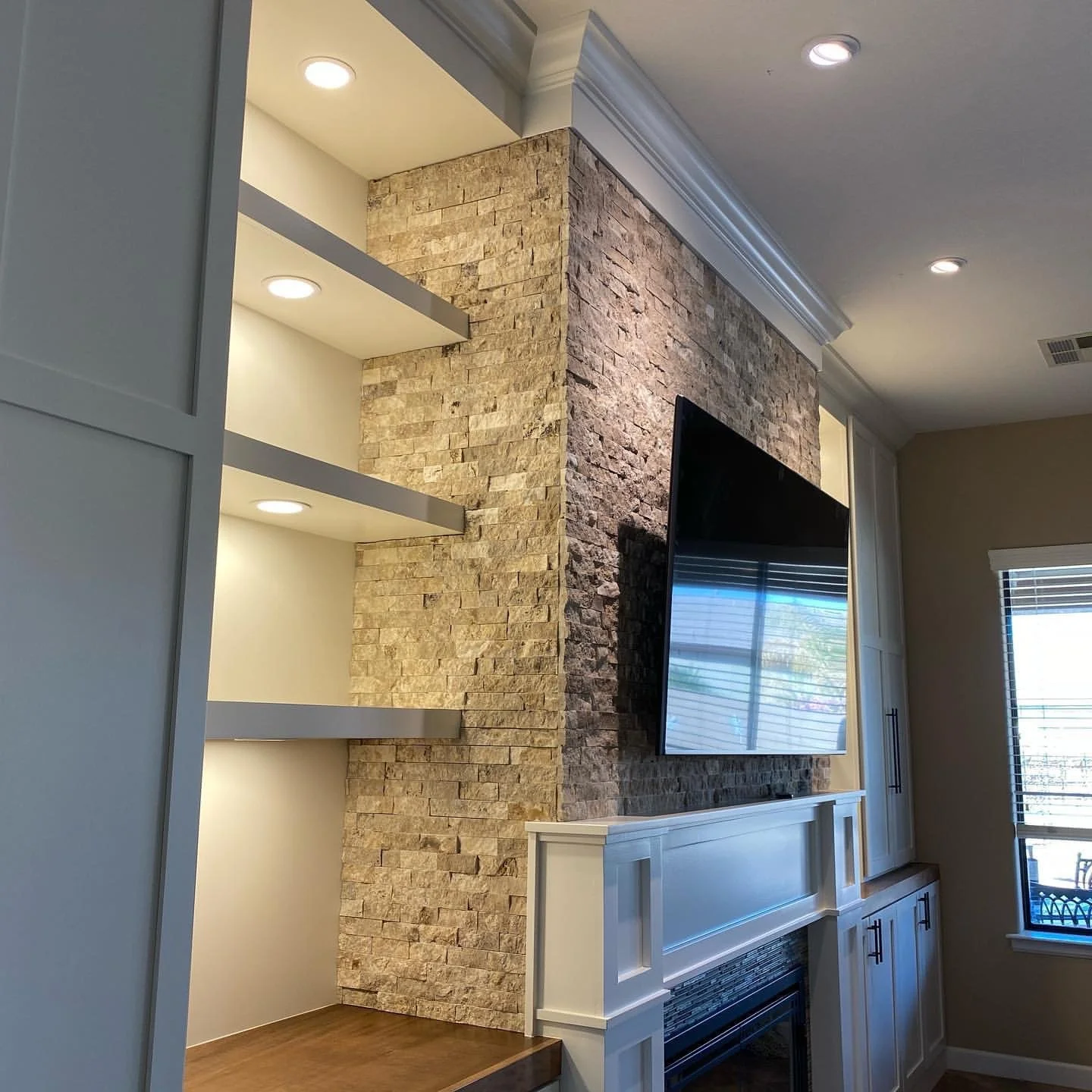built ins and fireplace with custom mantle