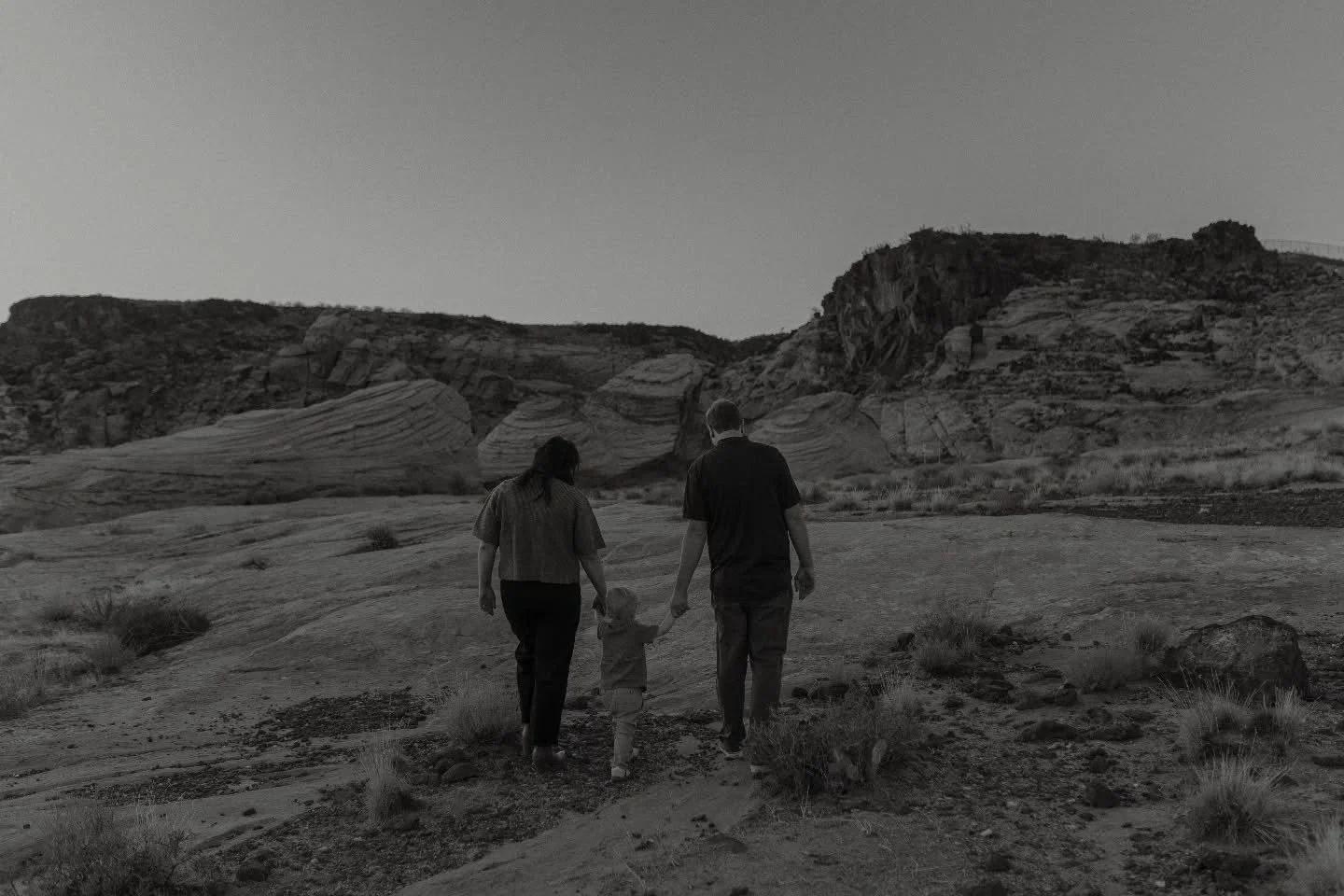 It's those sweet in-between moments I care so much to capture. Like walking back to the car after your session and mom is naturally holding her babies hand to walk over all the wobbly rocks, and dad runs up to join. These are the natural little momen