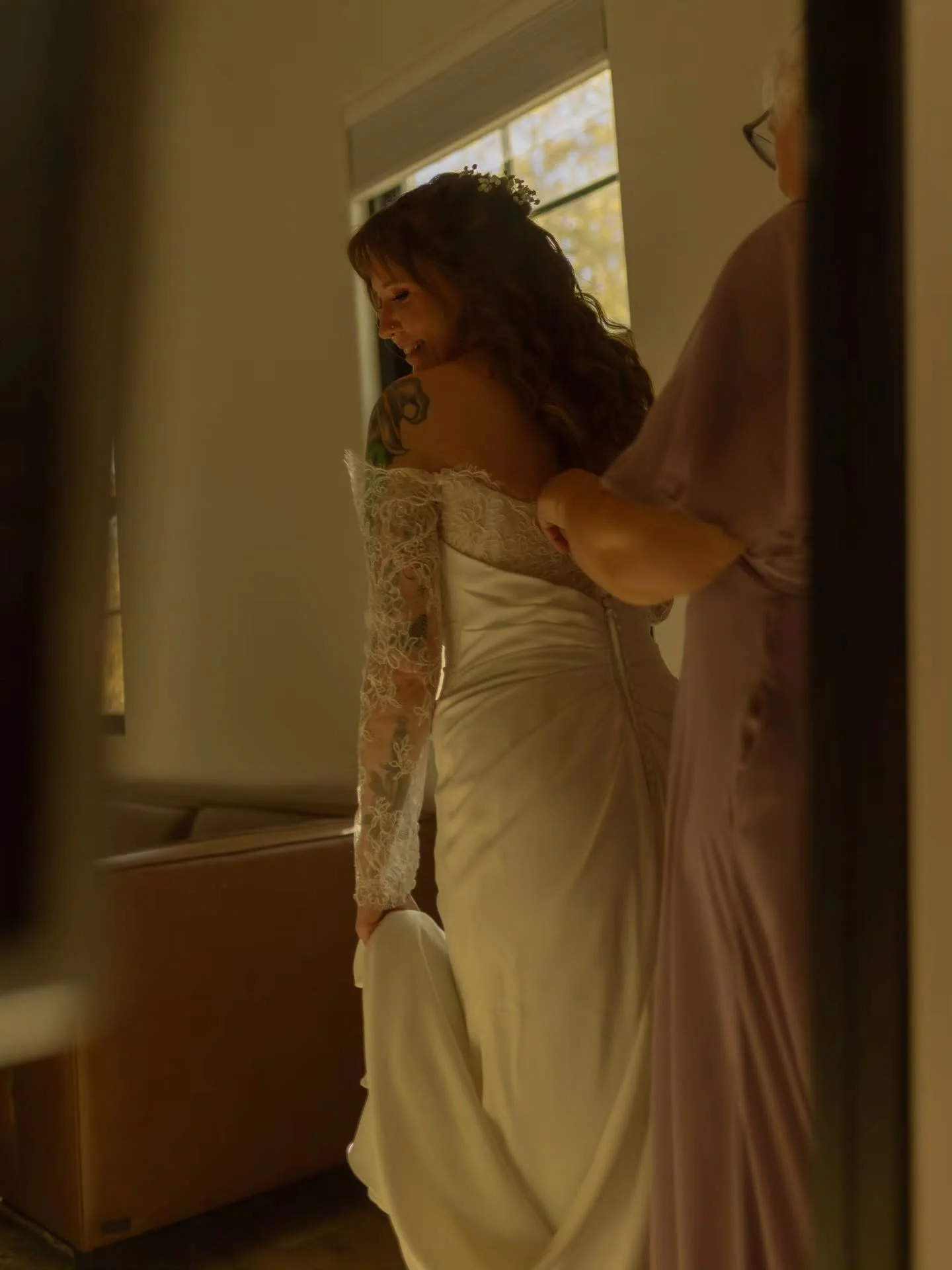 One of the most tender parts of a wedding day is watching the people who love you most help you into what you&rsquo;ll wear to marry your forever. Your mom&rsquo;s gentle hands, your nieces admiring the princess in front of them, your best friend try