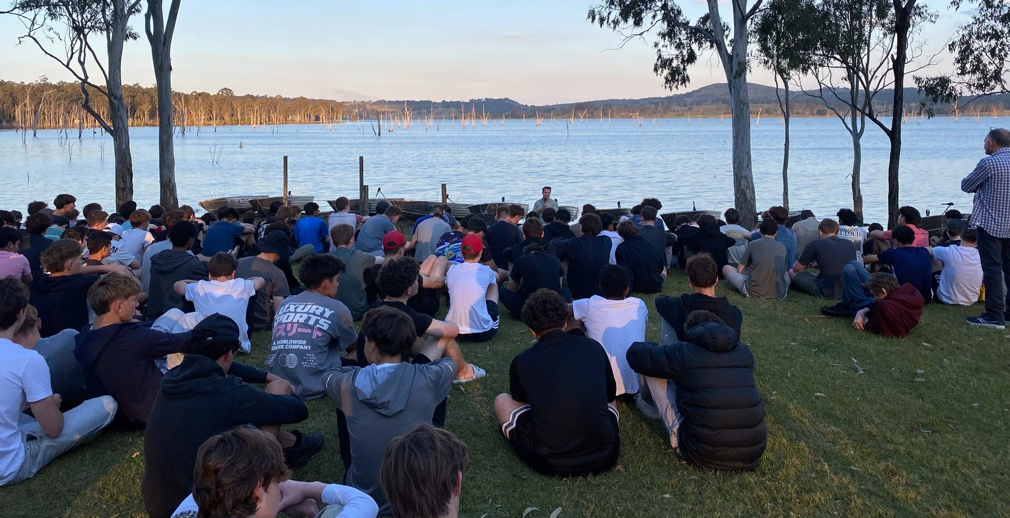 Ben speaking to a group of students