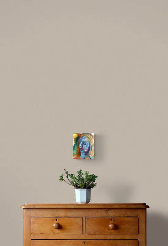 plant-on-wooden-drawers face.jpg
