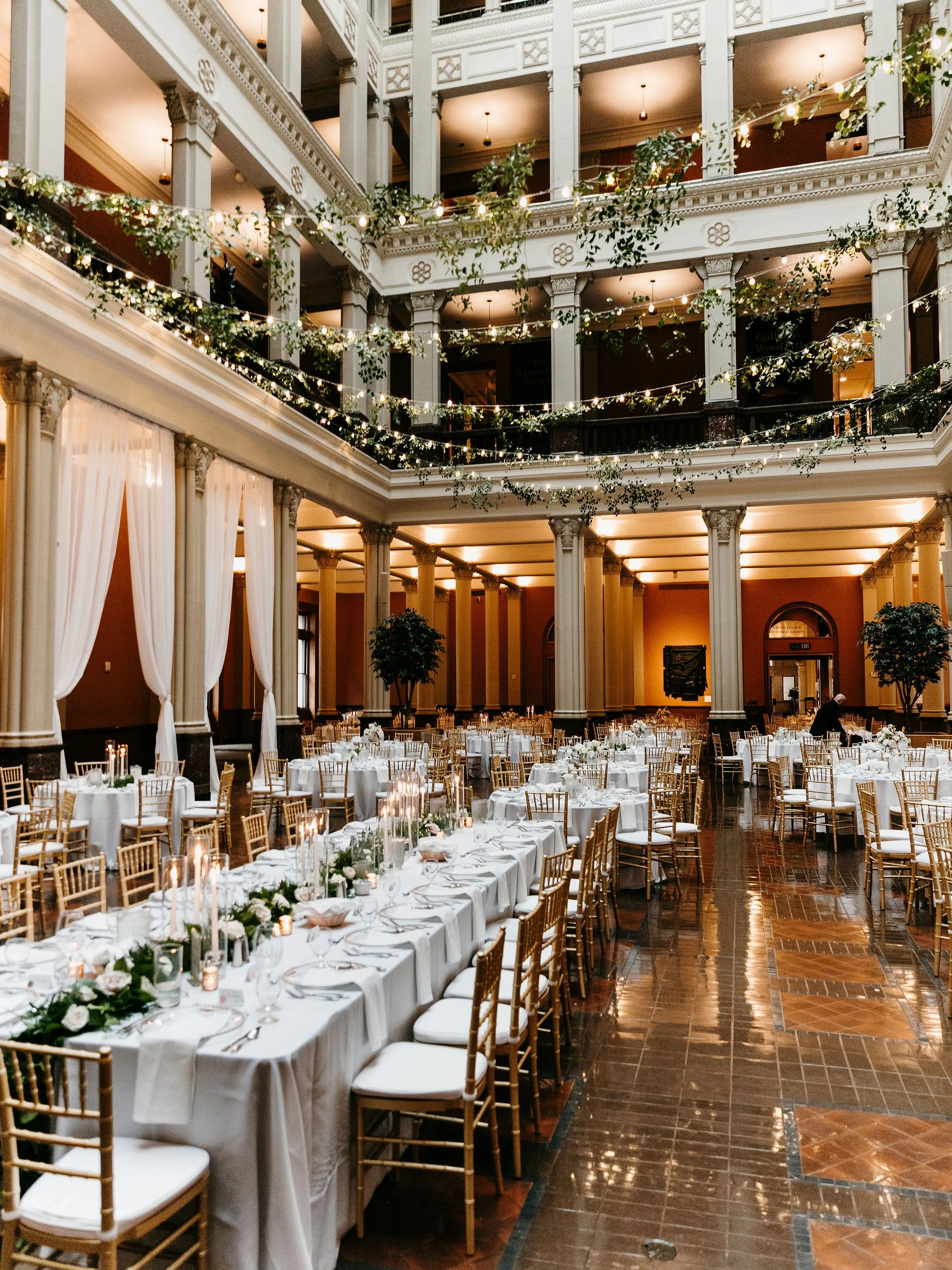 Wedding reception hanging greenery at landmark center