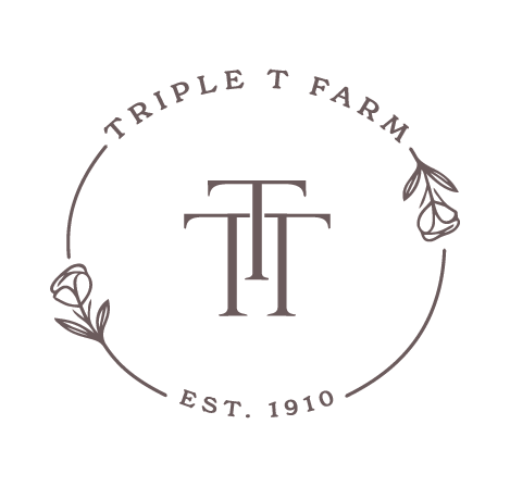 Logo for Triple T Farm featuring a circular design with the farm's name, established in 1910, and decorative floral elements.