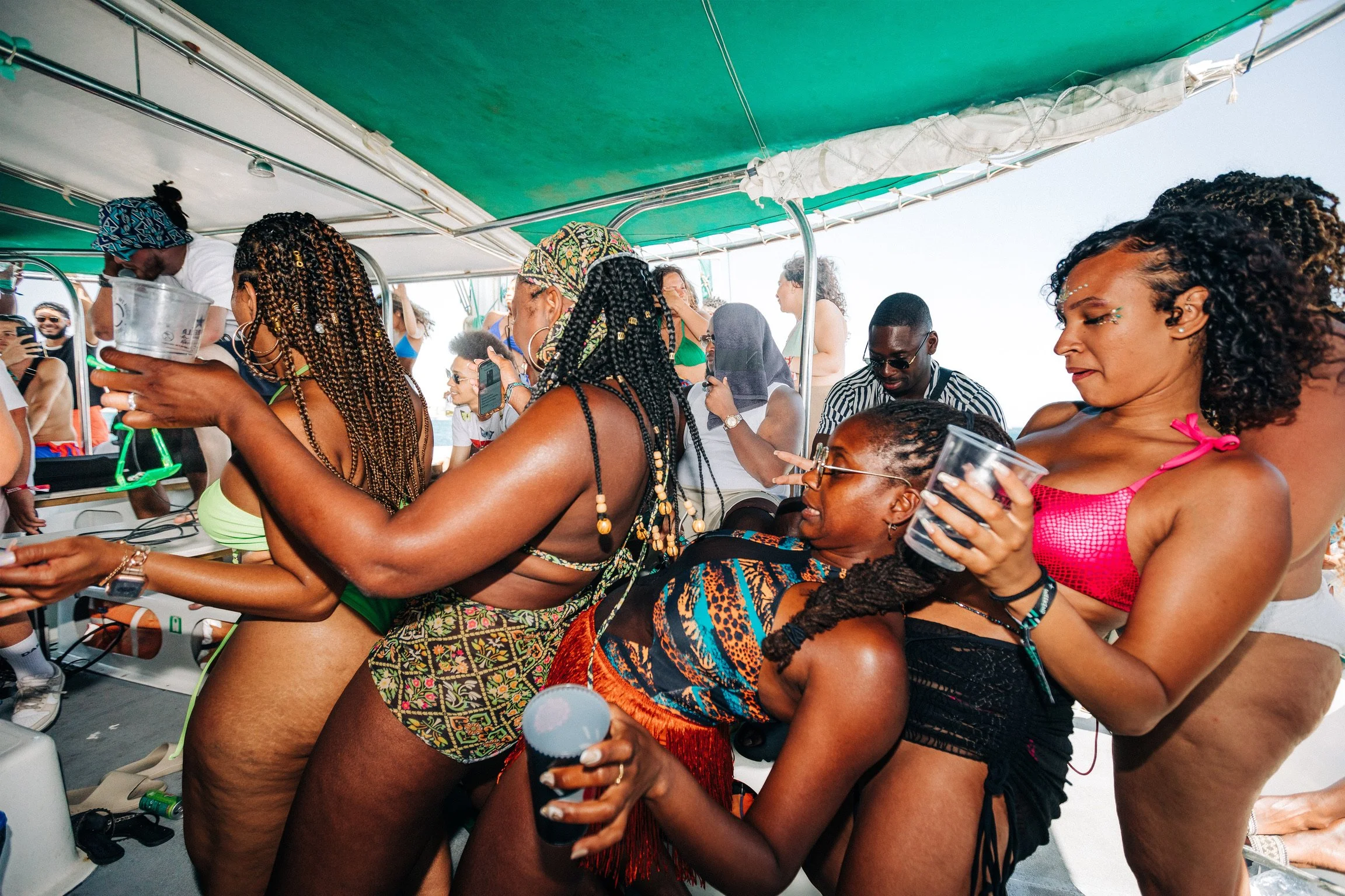 From above hands of unrecognizable woman rubbing aromatic spices into piece of raw meat over parchment paper