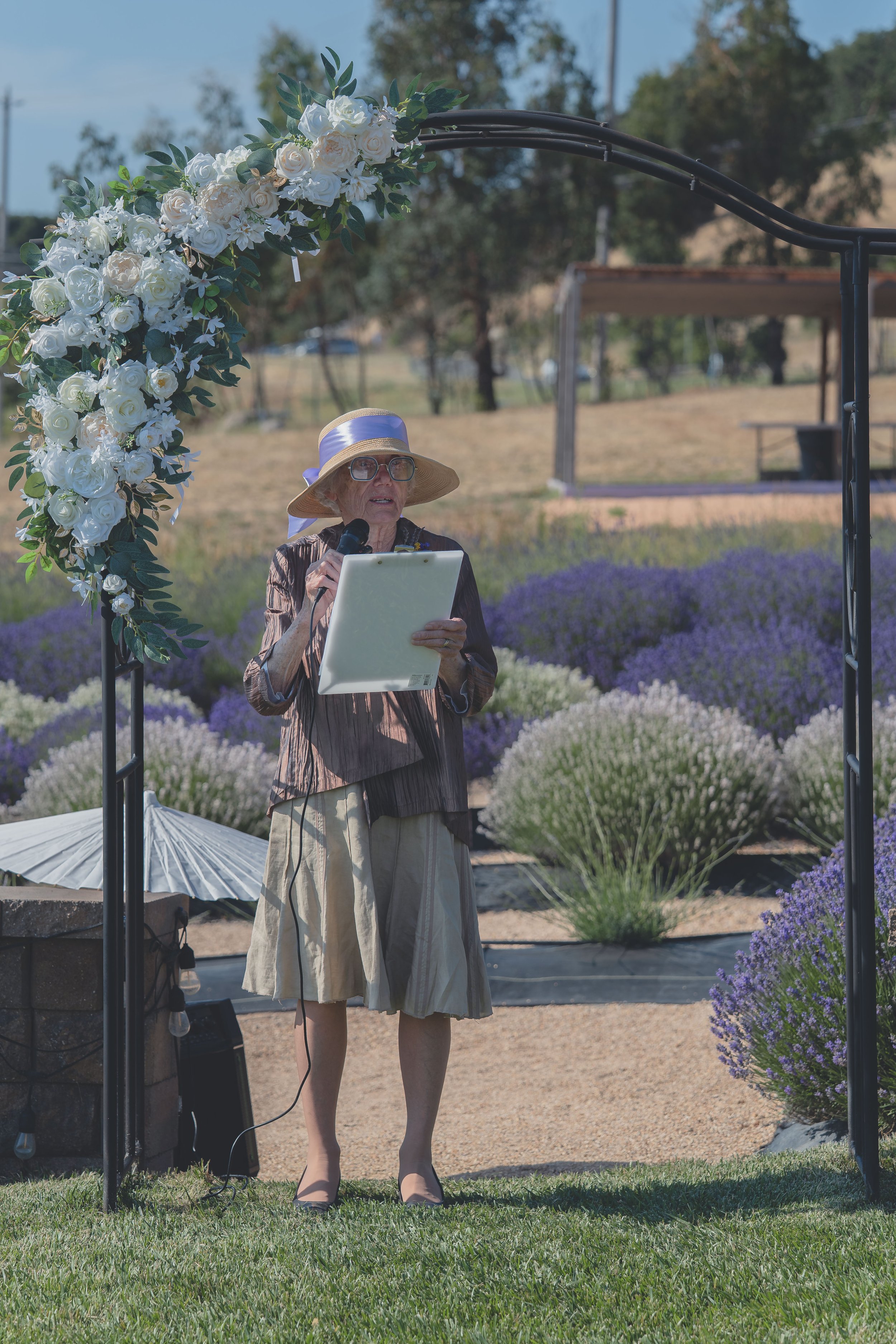 131. Individual guest portrait captured during the wedding ceremony in Sonoma.