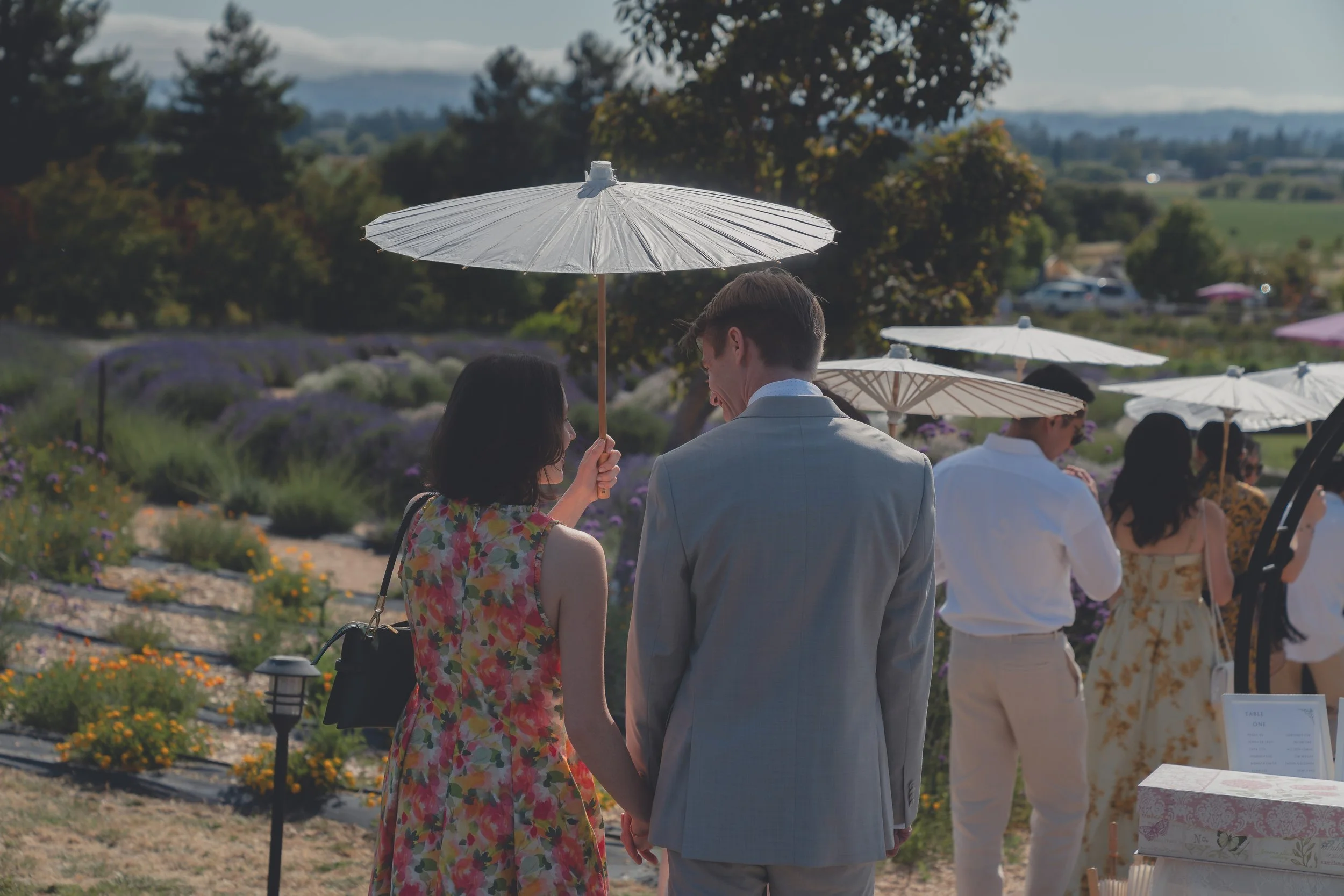 Guests enjoying the outdoor setting during Katherine and Calvin’s Sonoma wedding.