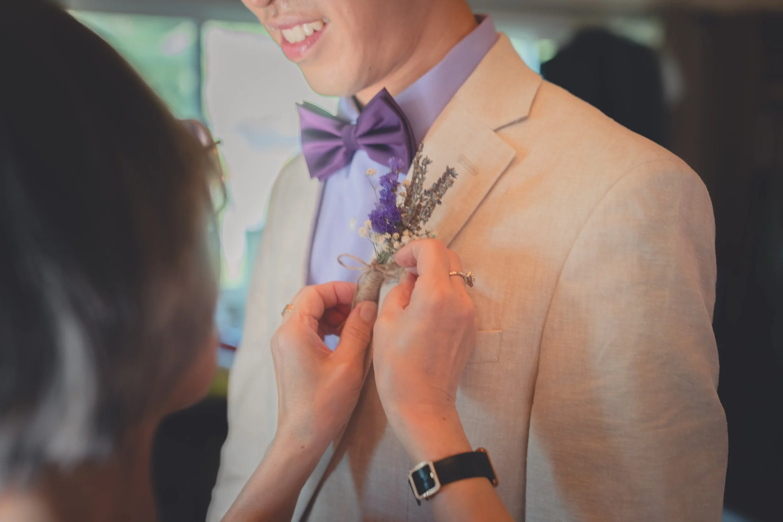 Candid wedding moment photographed during preparations in Sonoma.