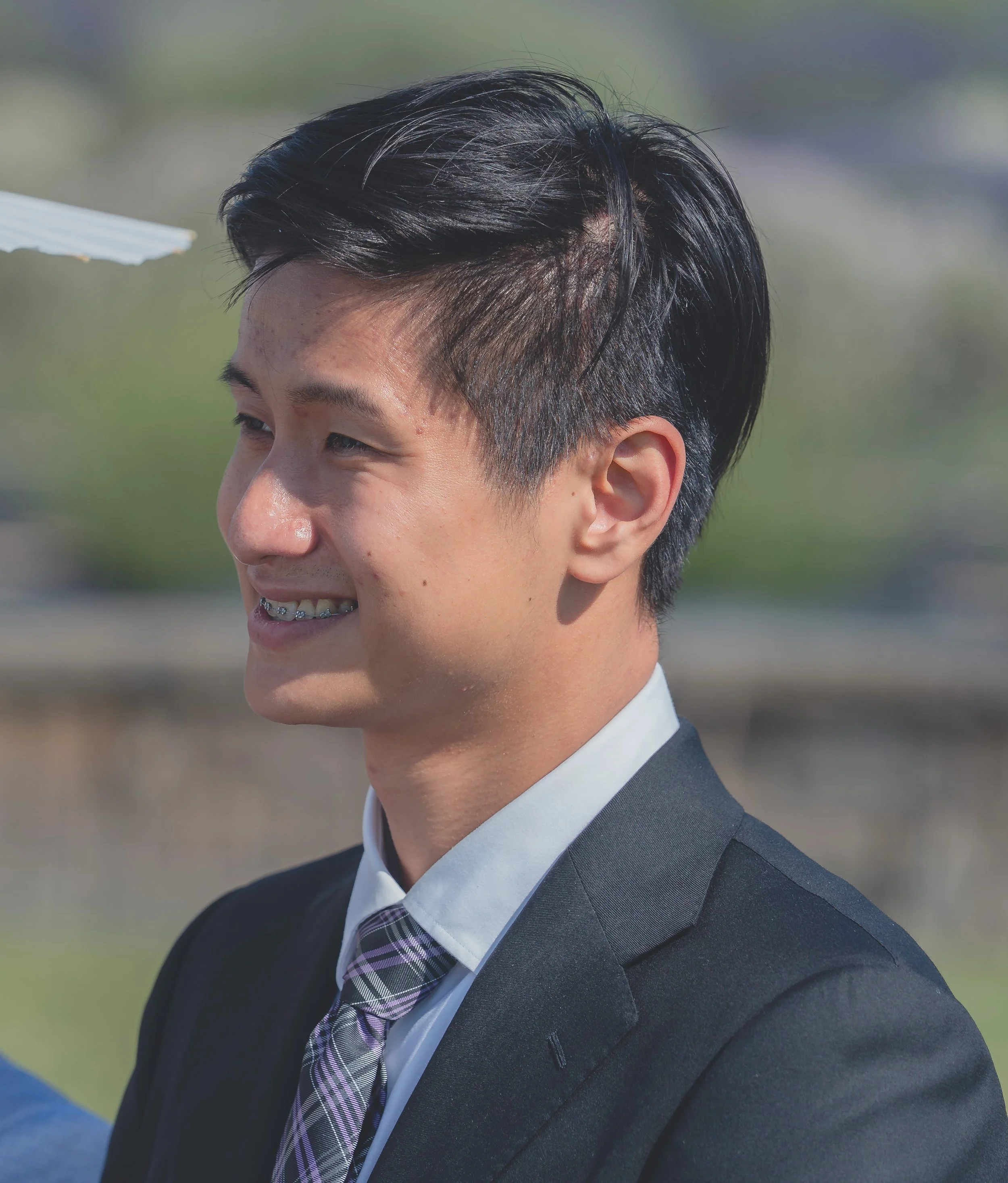 Wedding guest portrait captured naturally during Katherine and Calvin’s celebration.