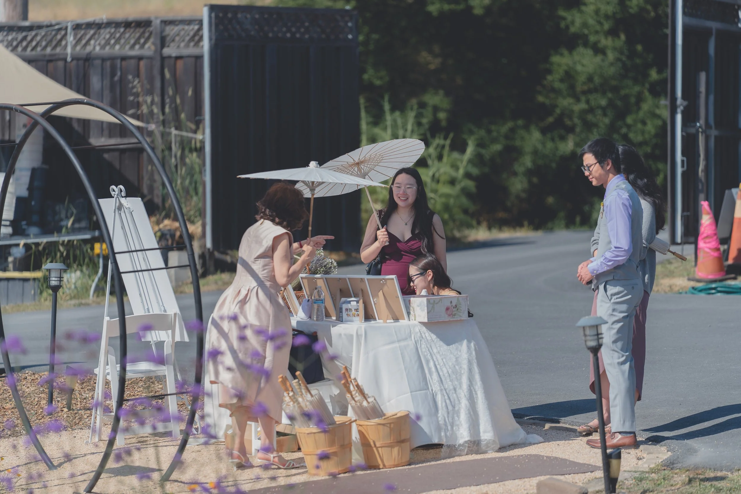 Guests walking toward the ceremony area during Katherine and Calvin’s Sonoma wedding.